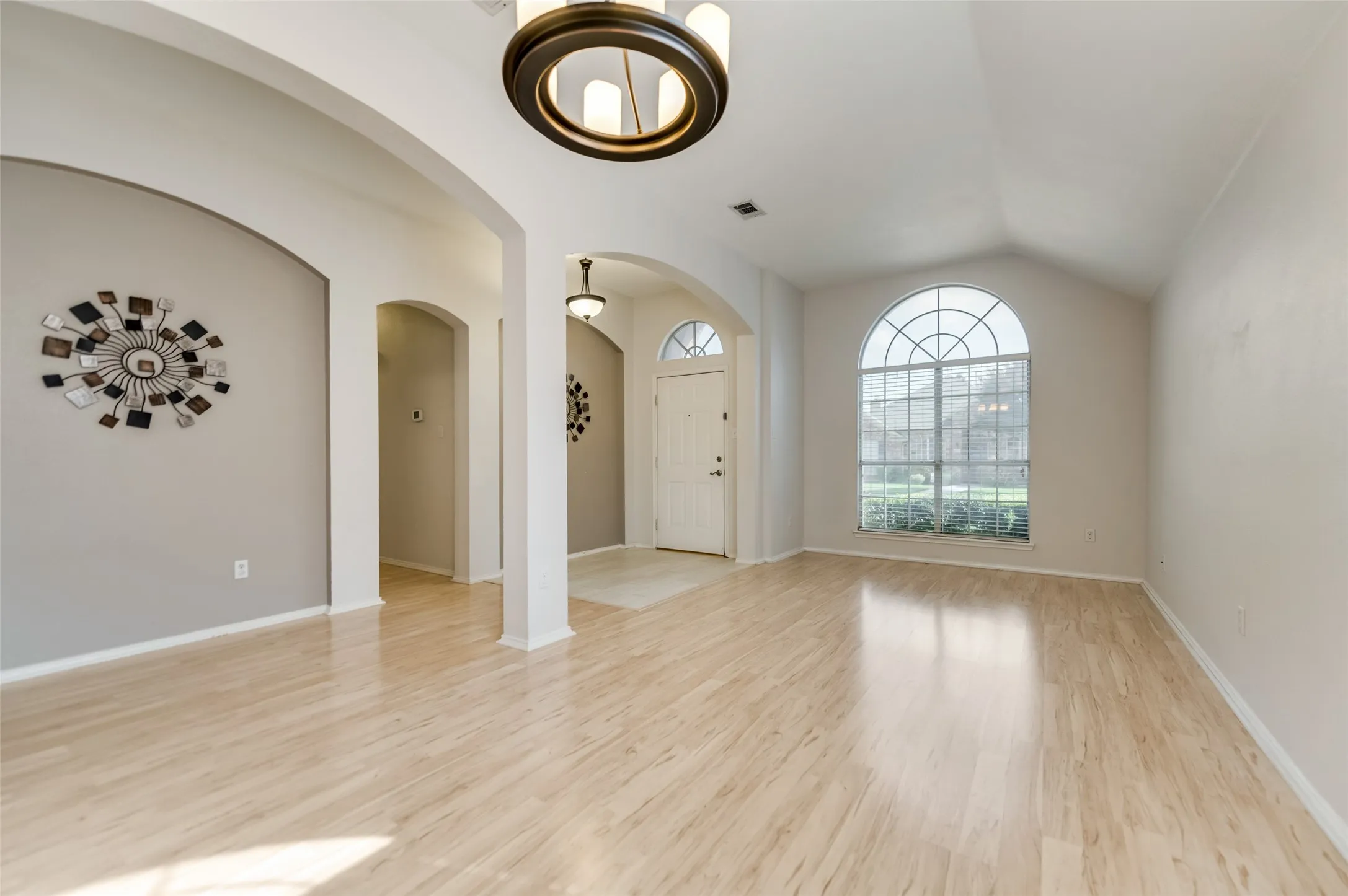 Formal Dining and Living combined to provide a large space and an open feel with decorative lights