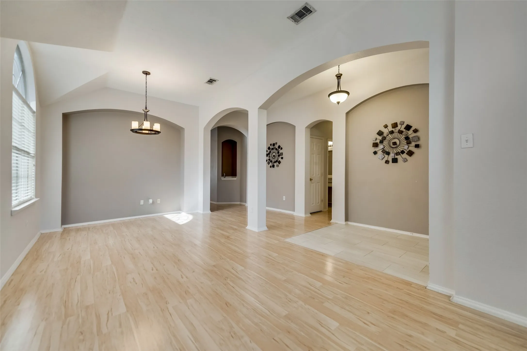Formal Dining and Living combined to provide a large space and an open feel with decorative lights