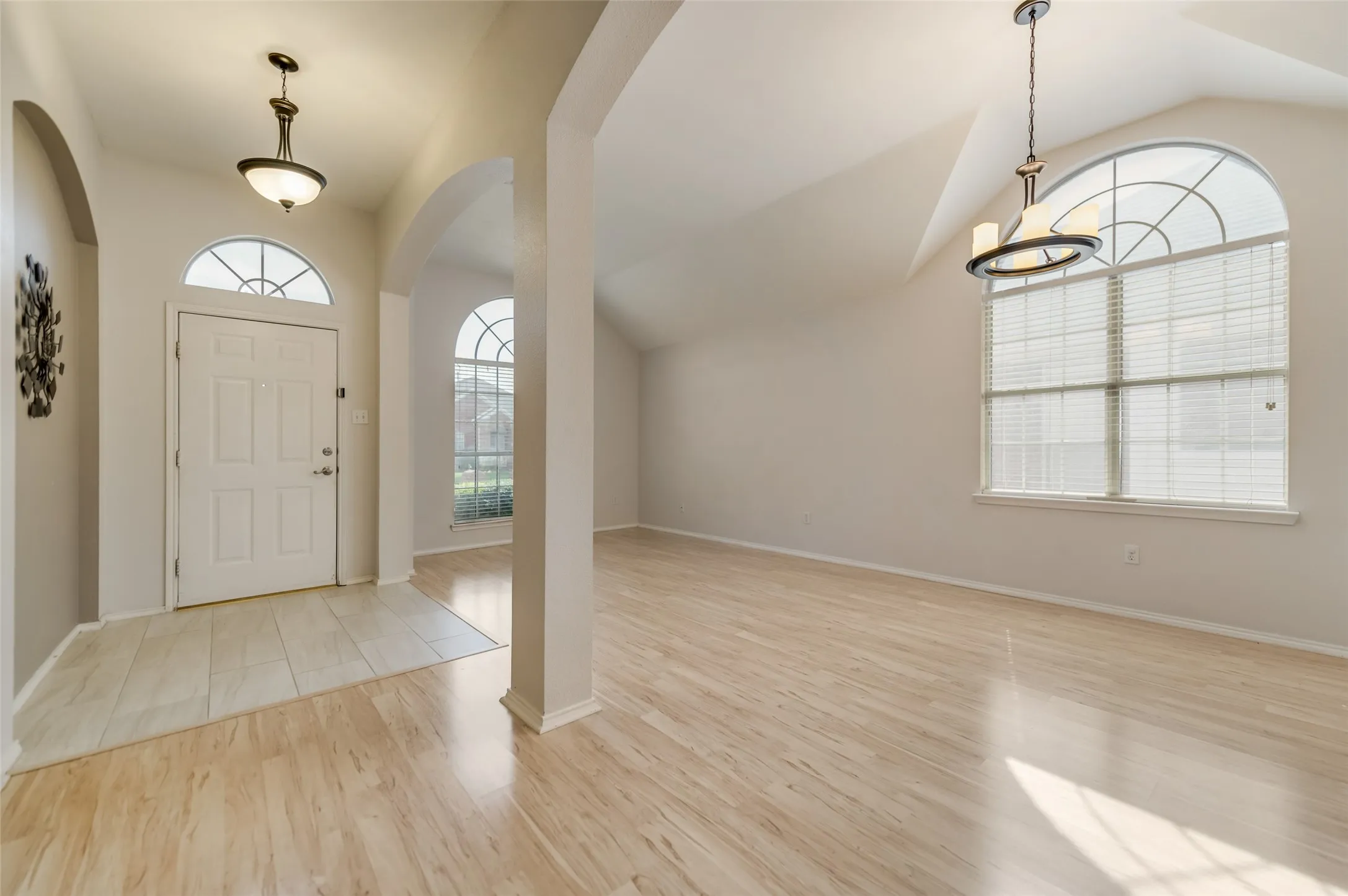 Formal Dining and Living combined to provide a large space and an open feel with decorative lights