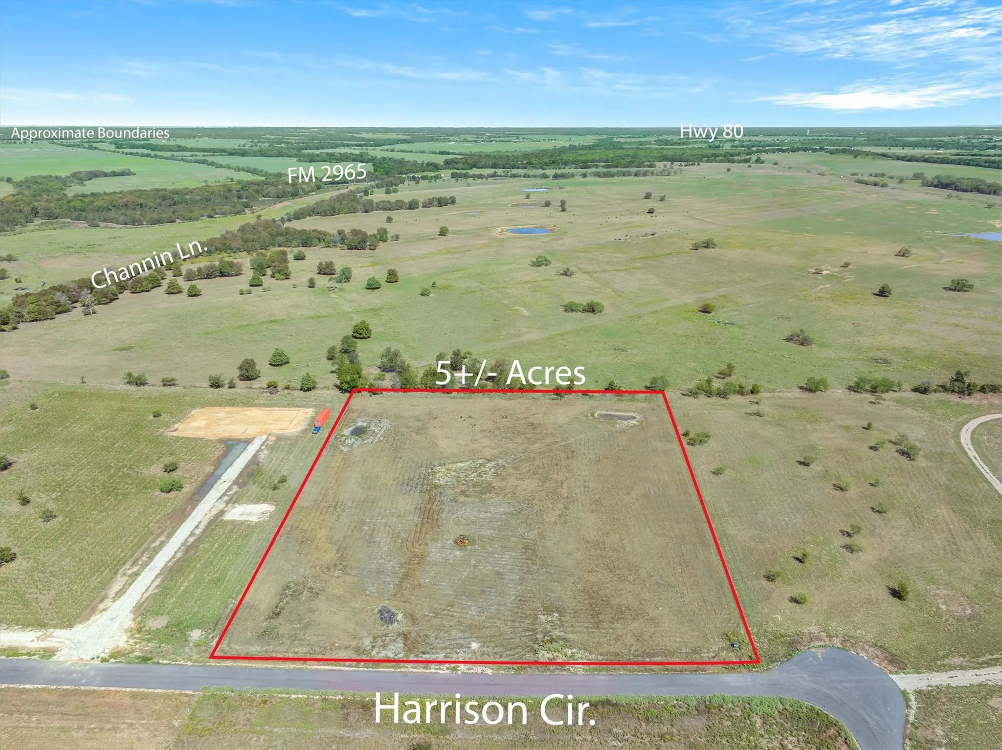 Expansive 5+/- acre lot featuring a level terrain