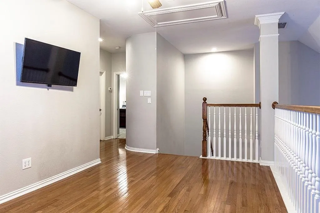 Loft Living Room overlooks Family Room below.