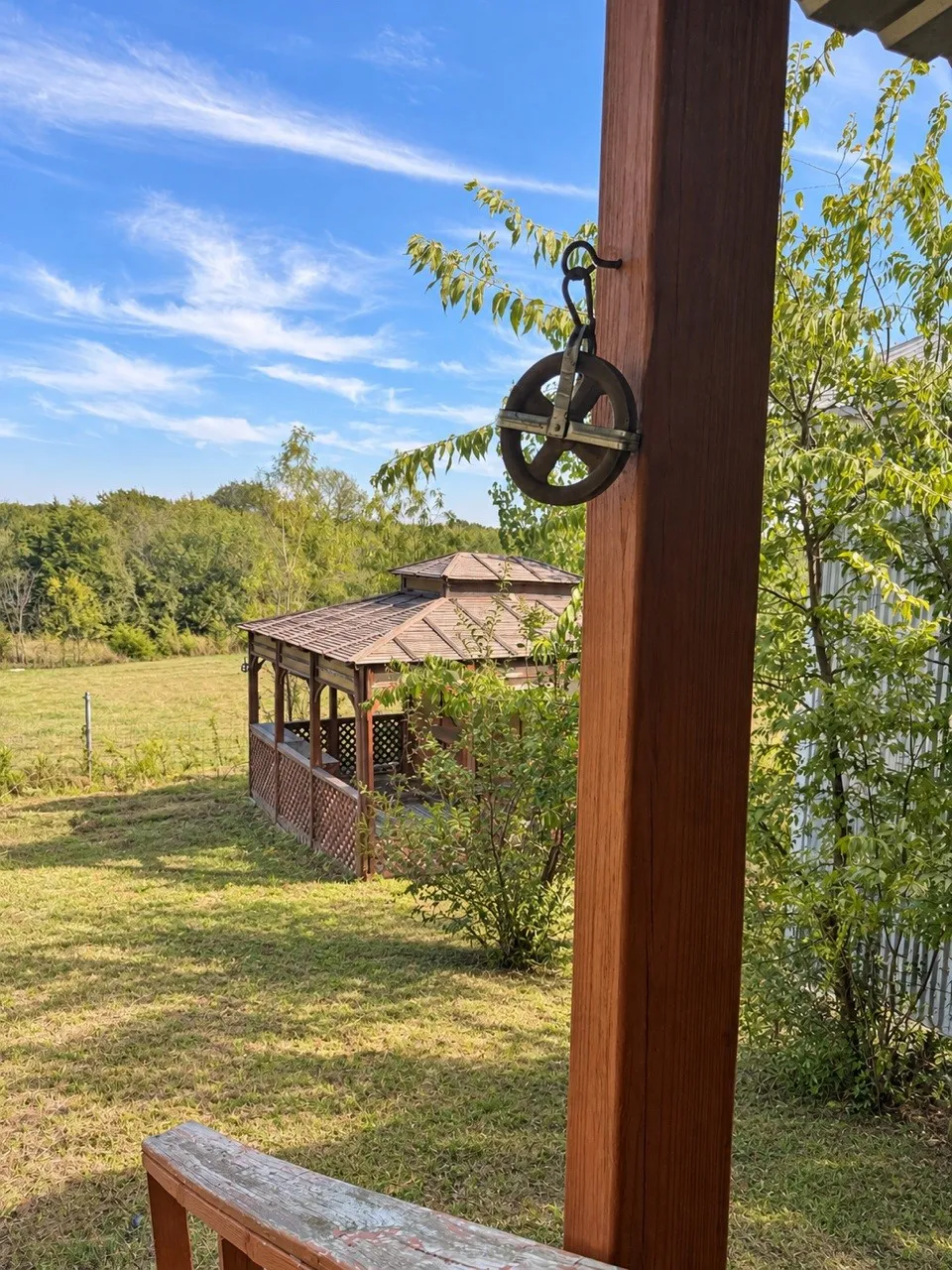 view from front house side porch, gazebo