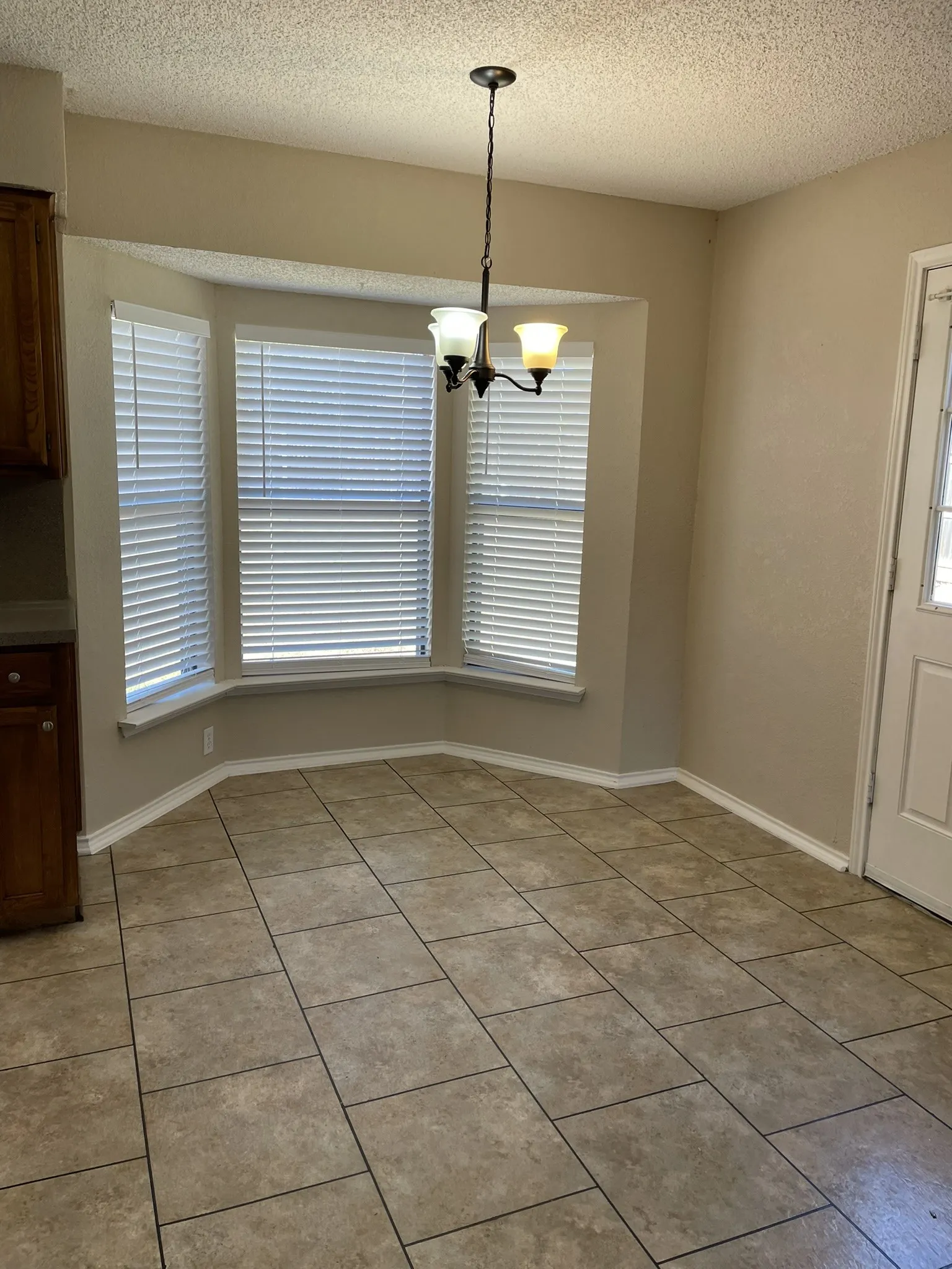 A bay window creates additional space.