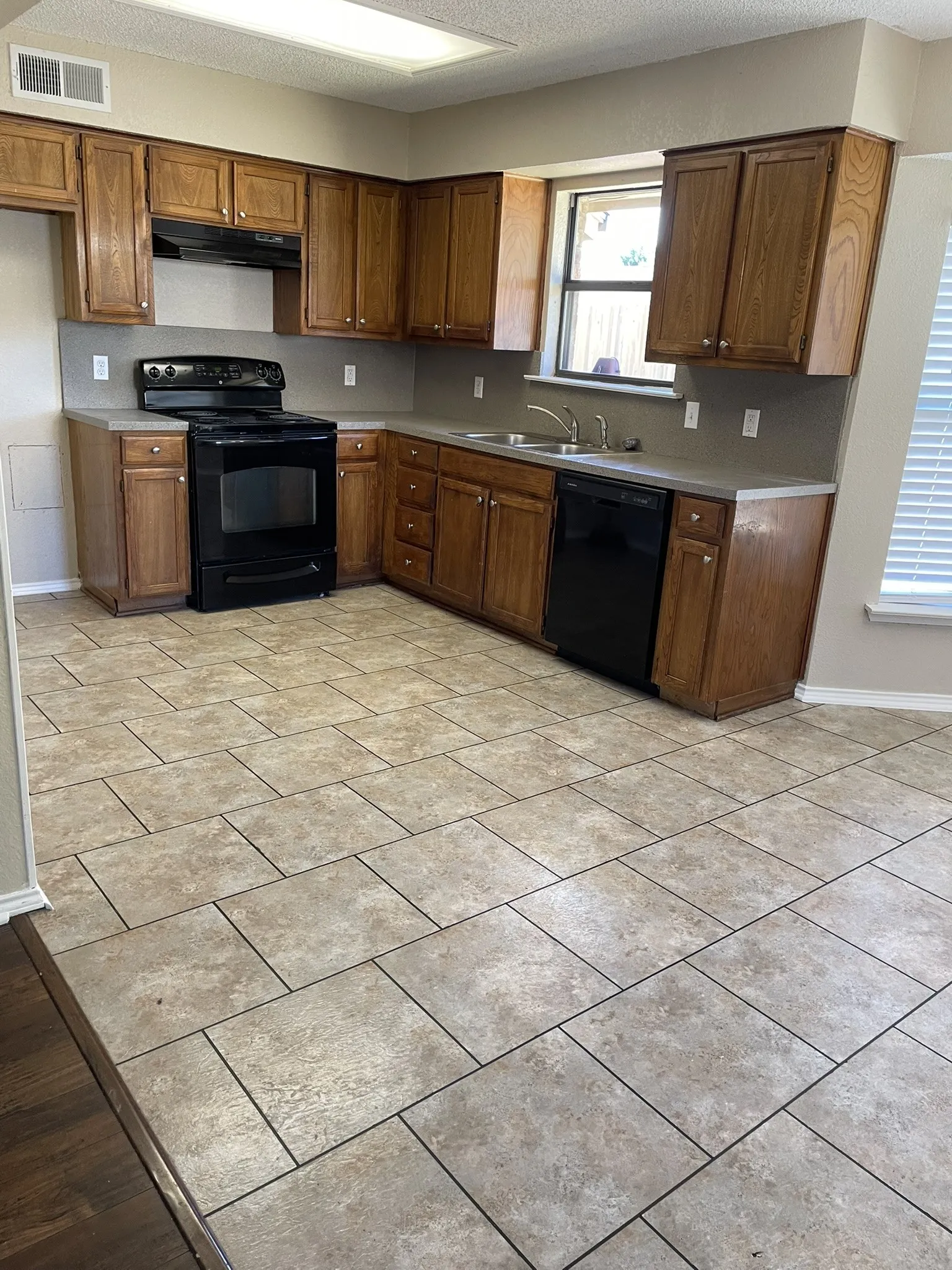 A great view of the large backyard is enjoyed from the kitchen.
