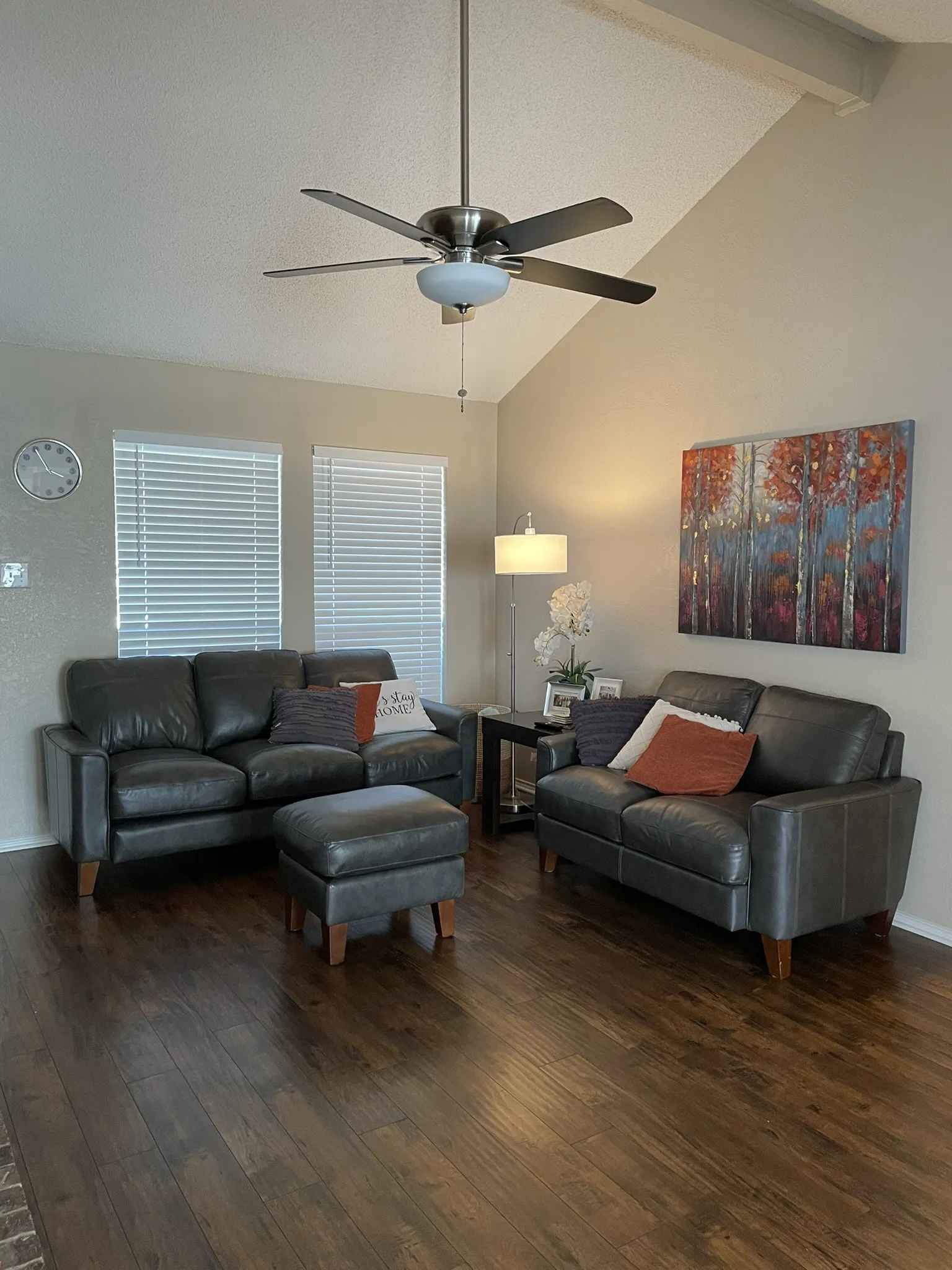 A lofted ceiling makes the room feel spacious.
