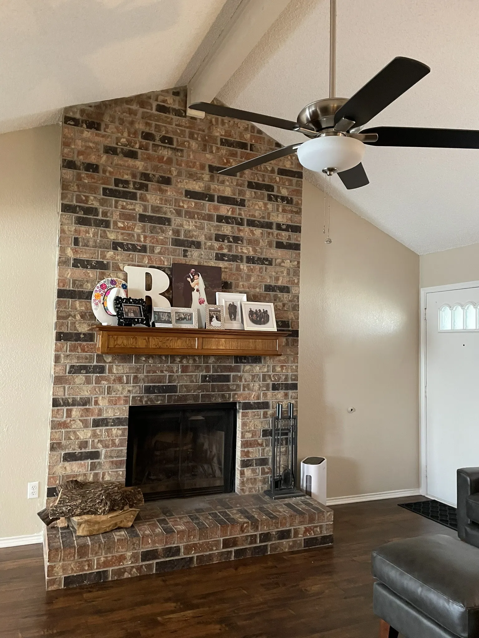 Beside the warming fireplace is a cozy spot for those cold winter days.