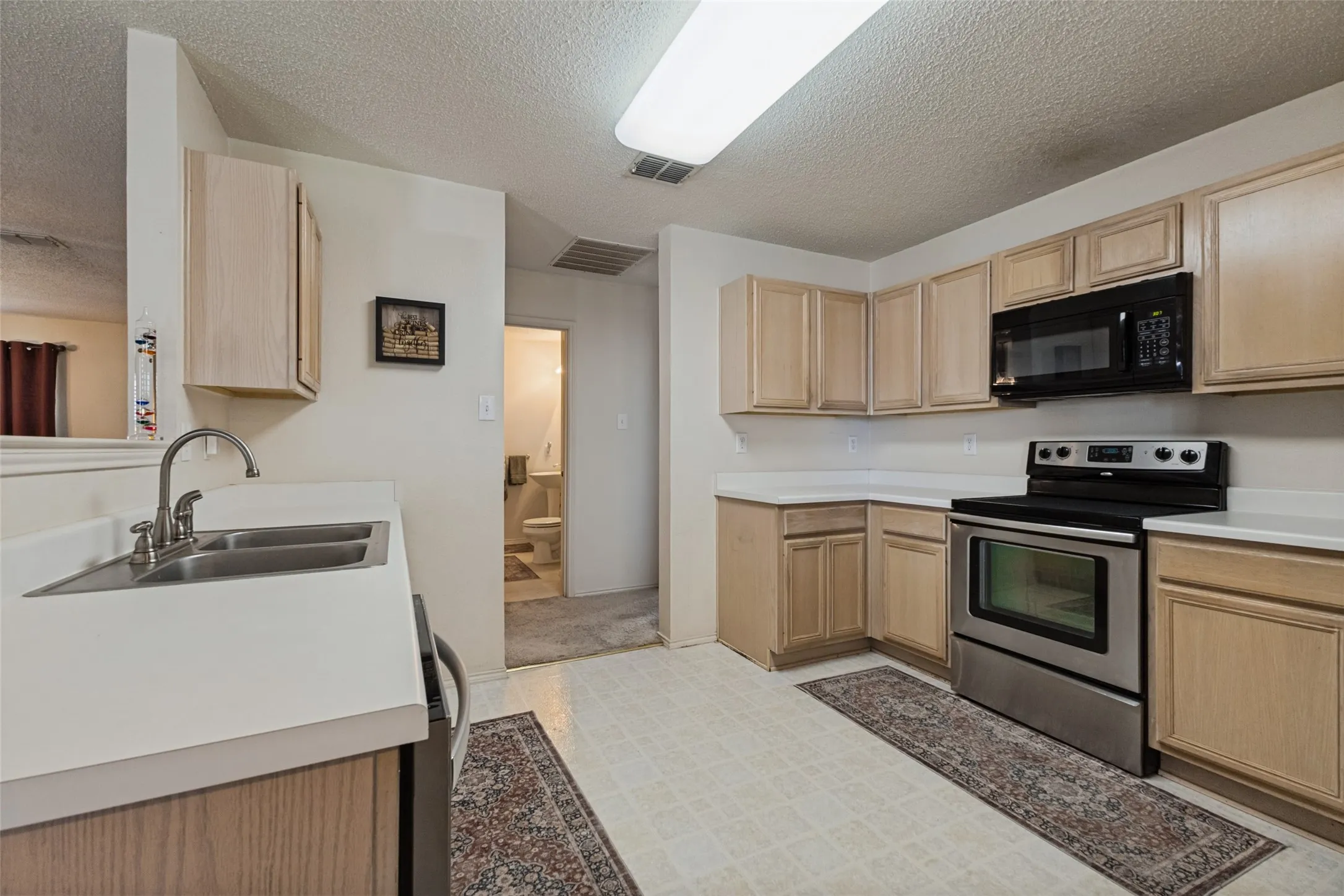 Electric smooth top range with built in microwave