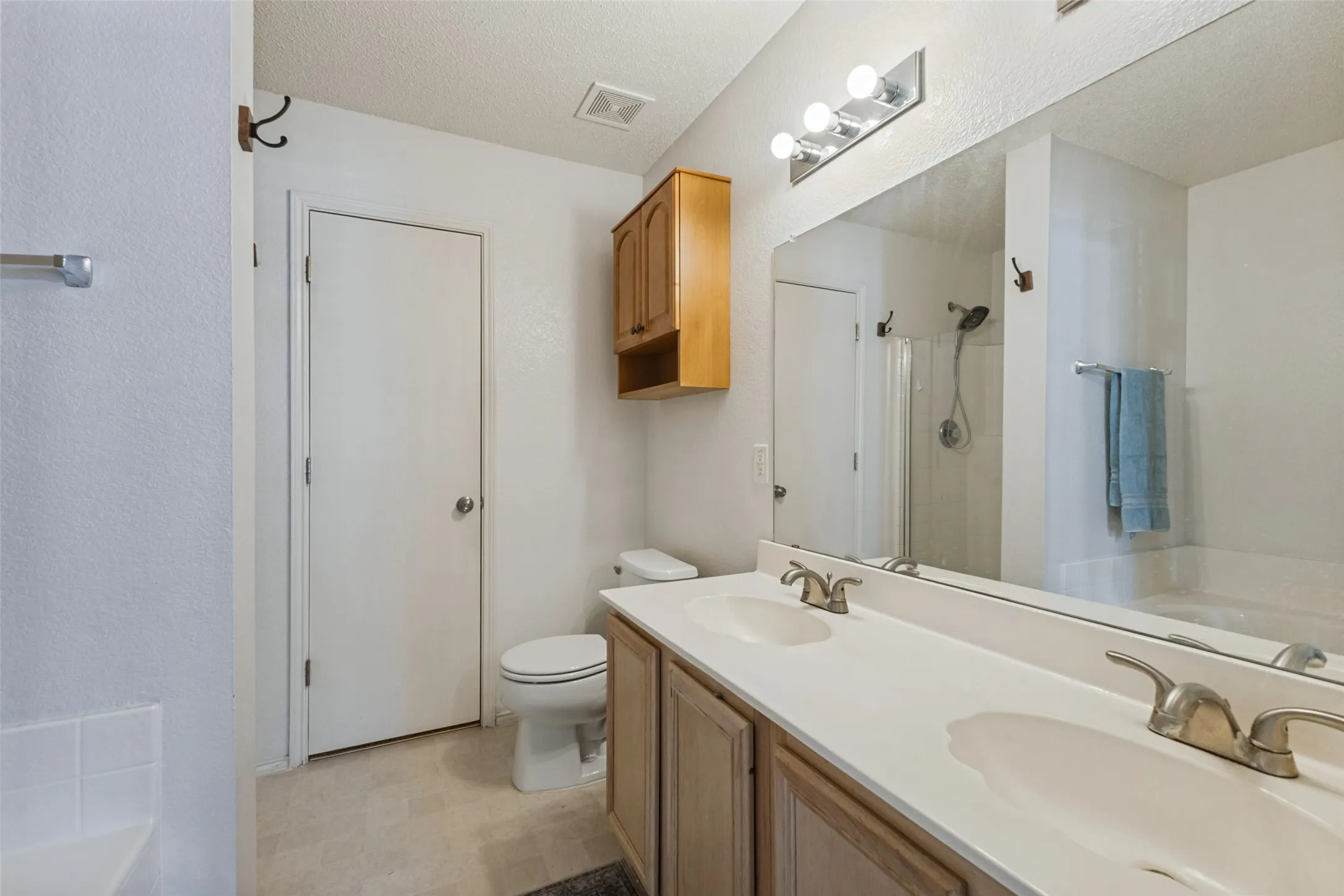 Large walk in closet is behind the door