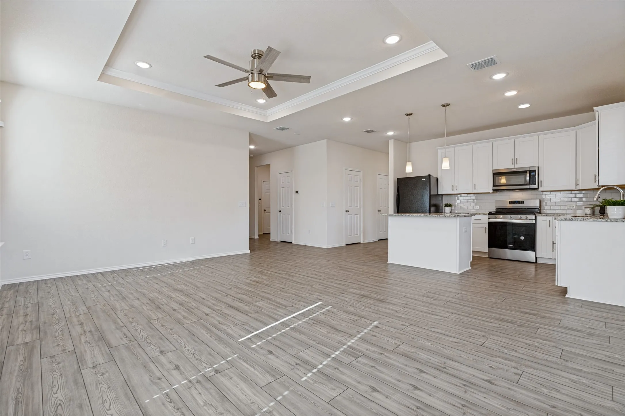 Luxury vinyl plank throughout the main areas