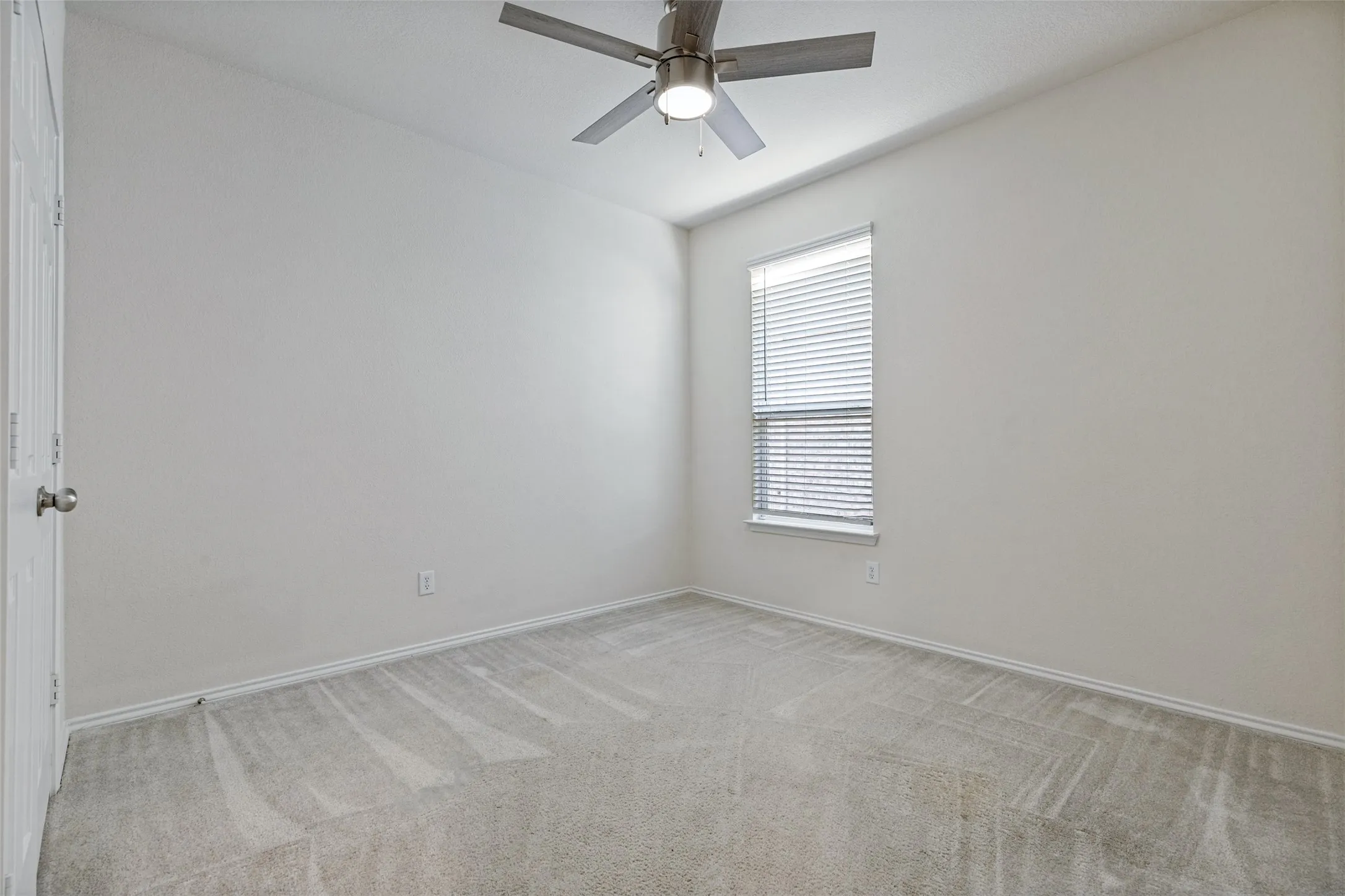 Another secondary bedroom at front of house
