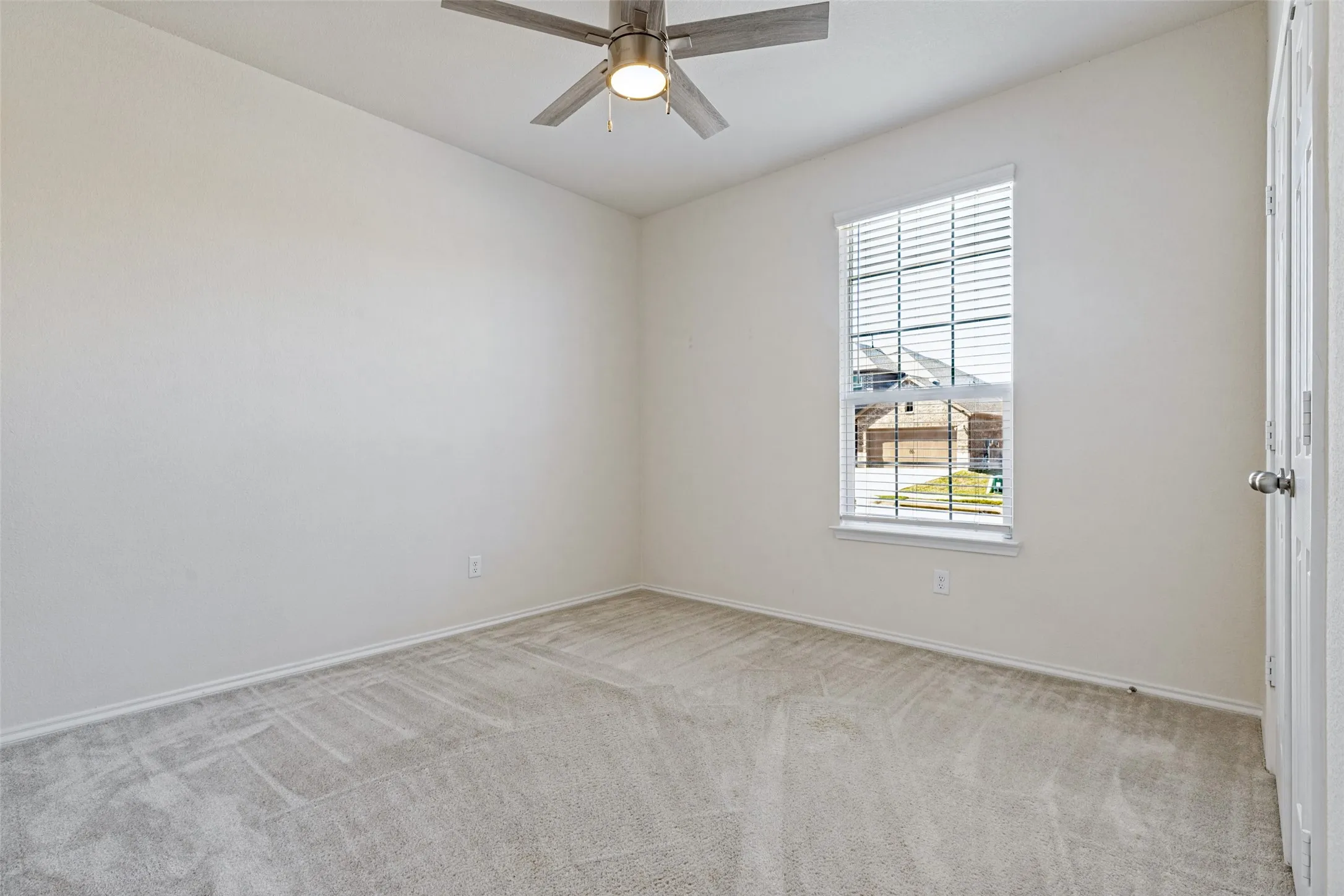 Secondary bedroom at front of house