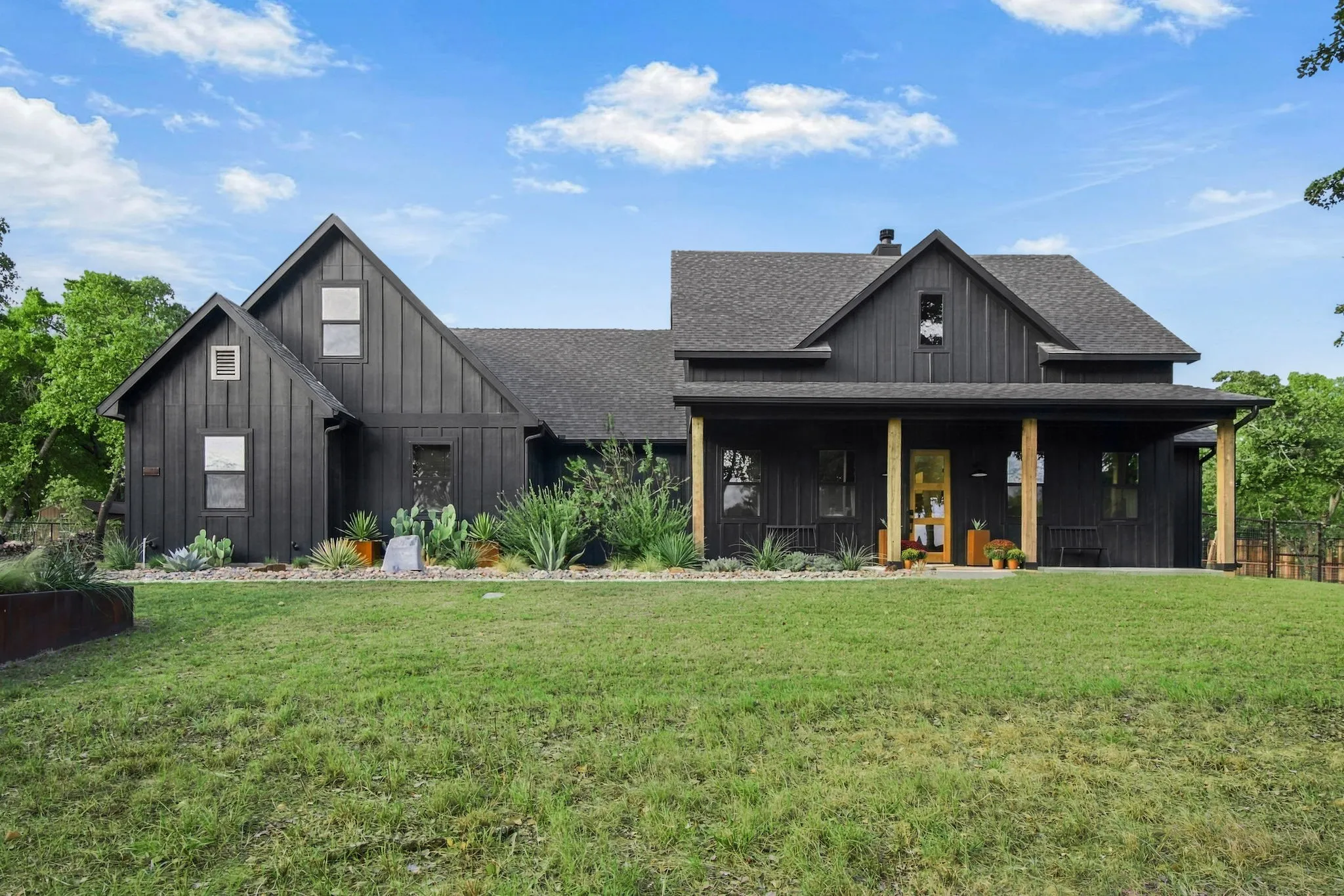 Amazing modern farmhouse with xeriscape and native plants