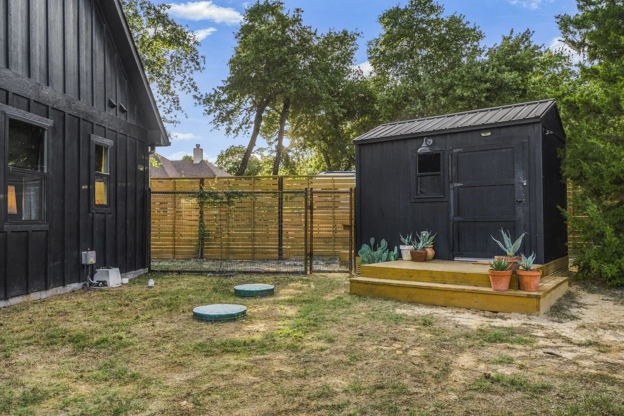 Outbuilding with electric, storage and climate controlled dog kennel