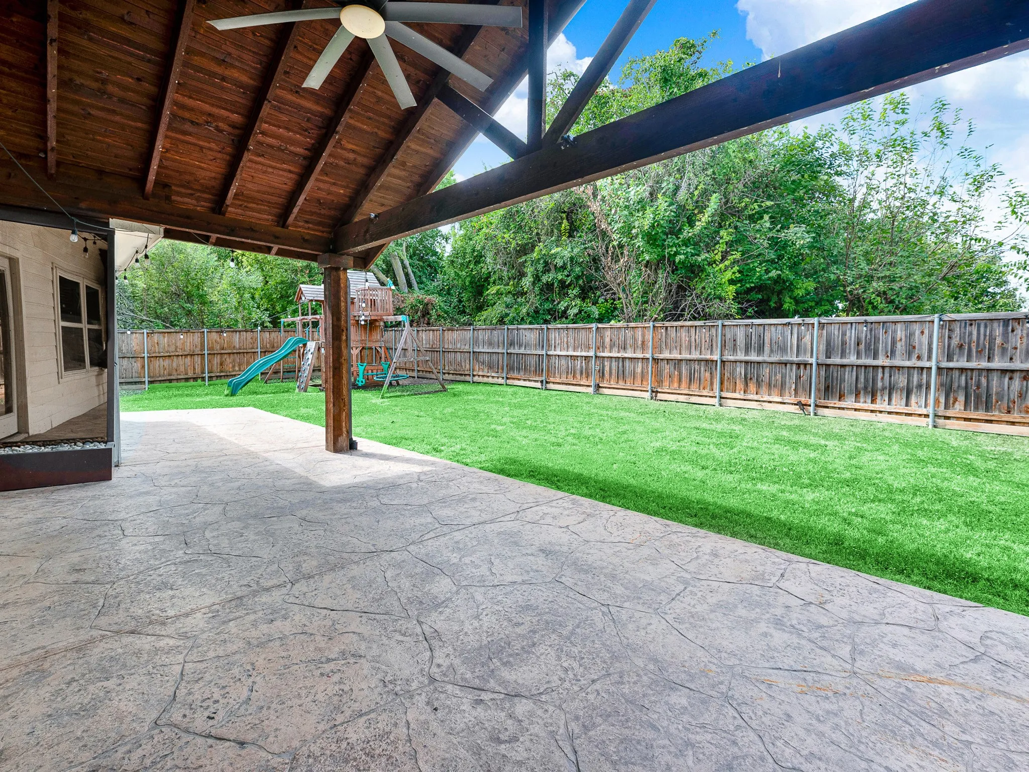 Extended and covered patio, perfect for morning coffee or evening entertaining