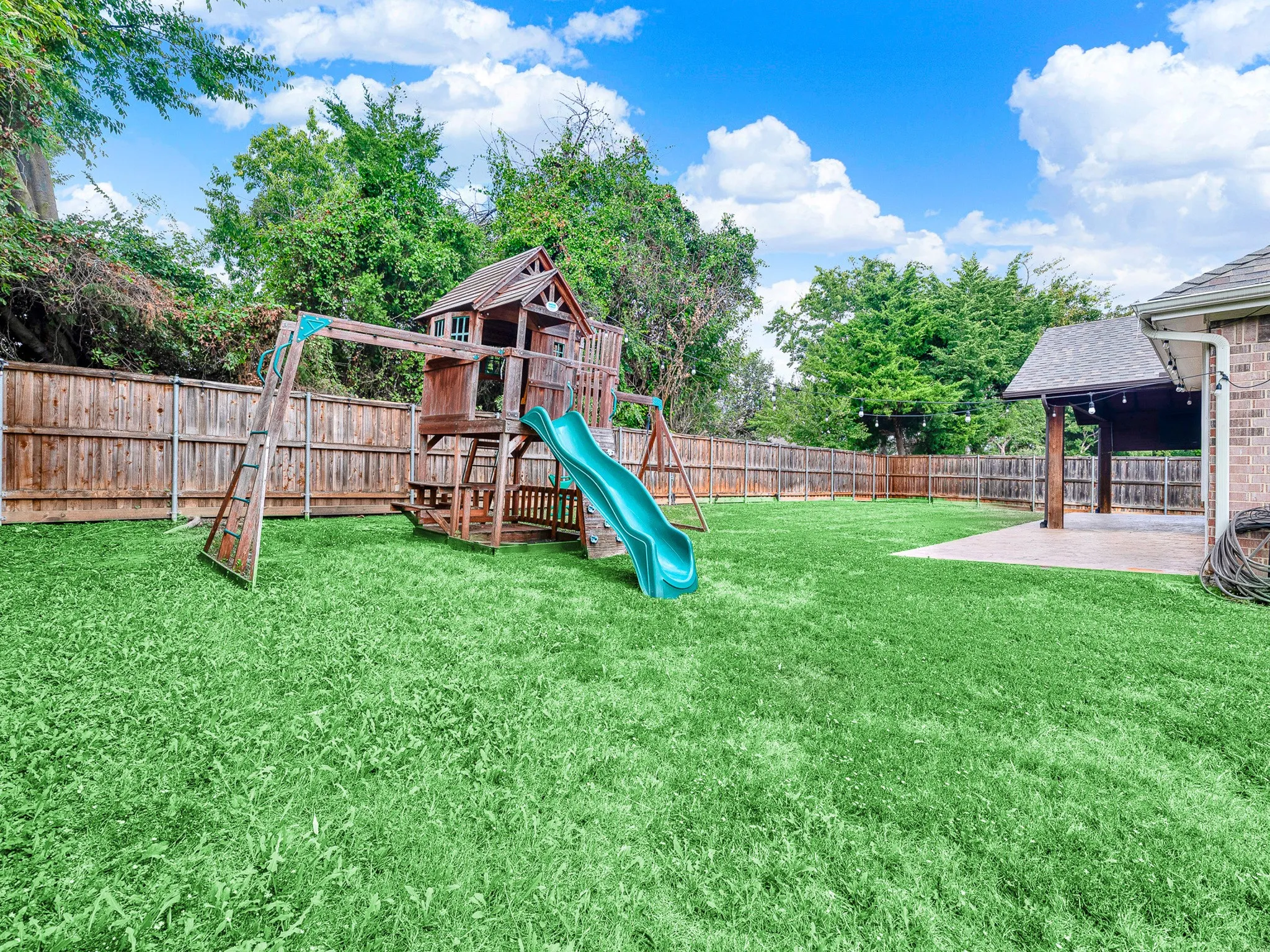 Custom built playground in a private backyard