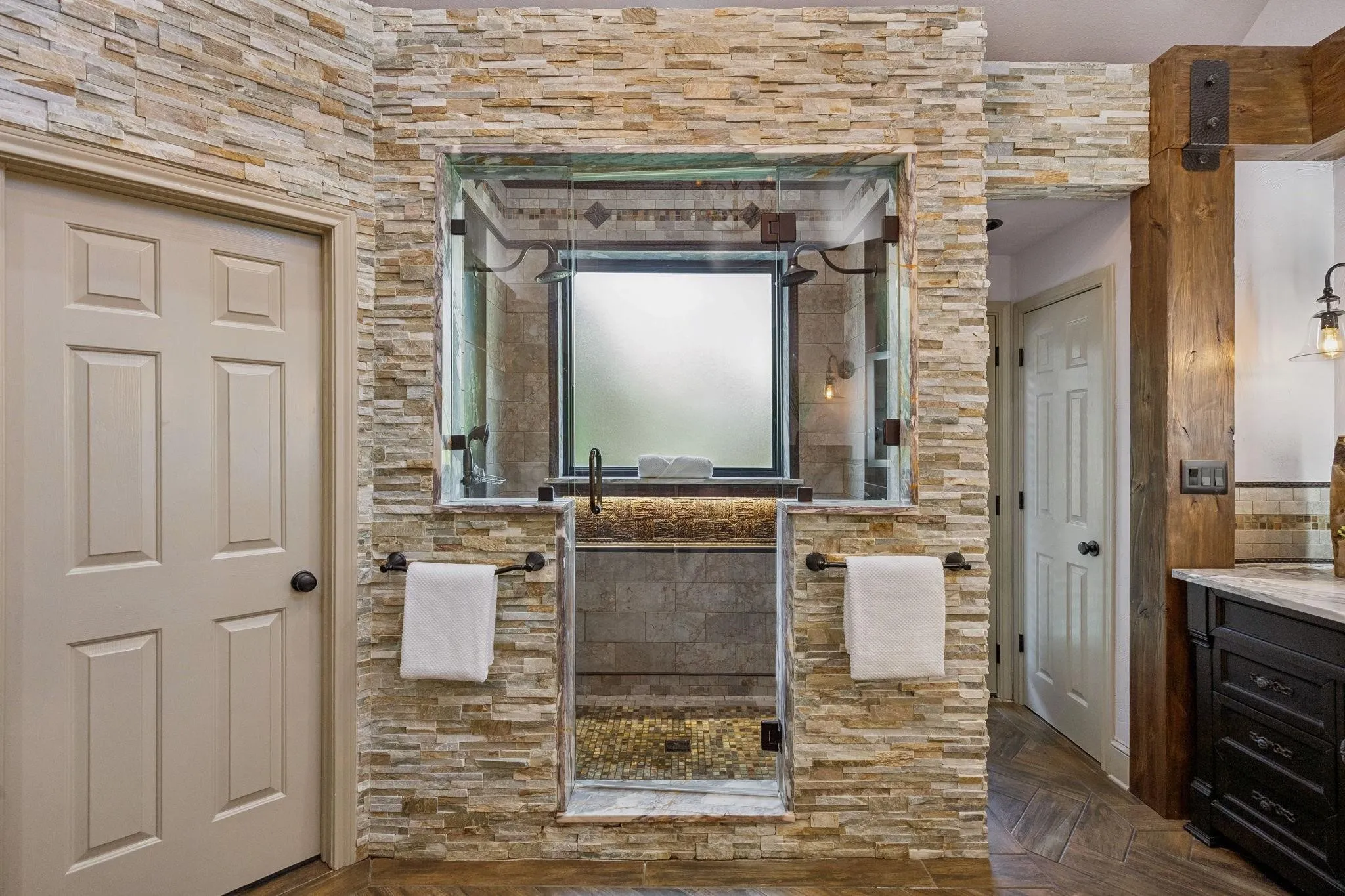 Spa-inspired primary bath with designer finishes.