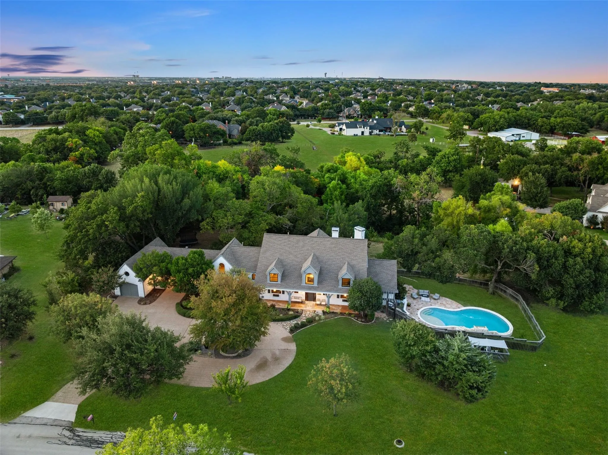 Beautiful architectural details surrounded by mature landscaping.
