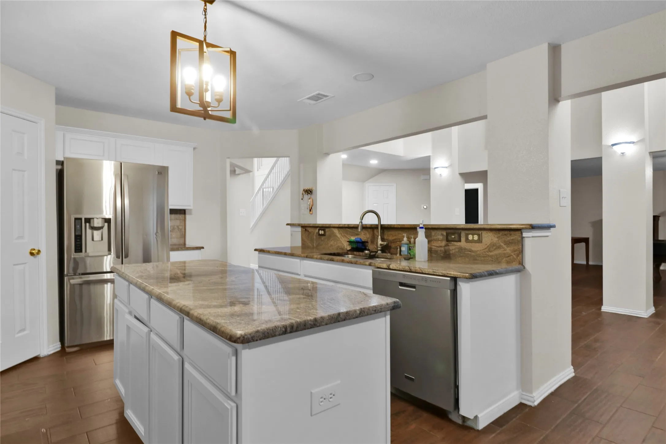 Island has additional cabinet space as well.
