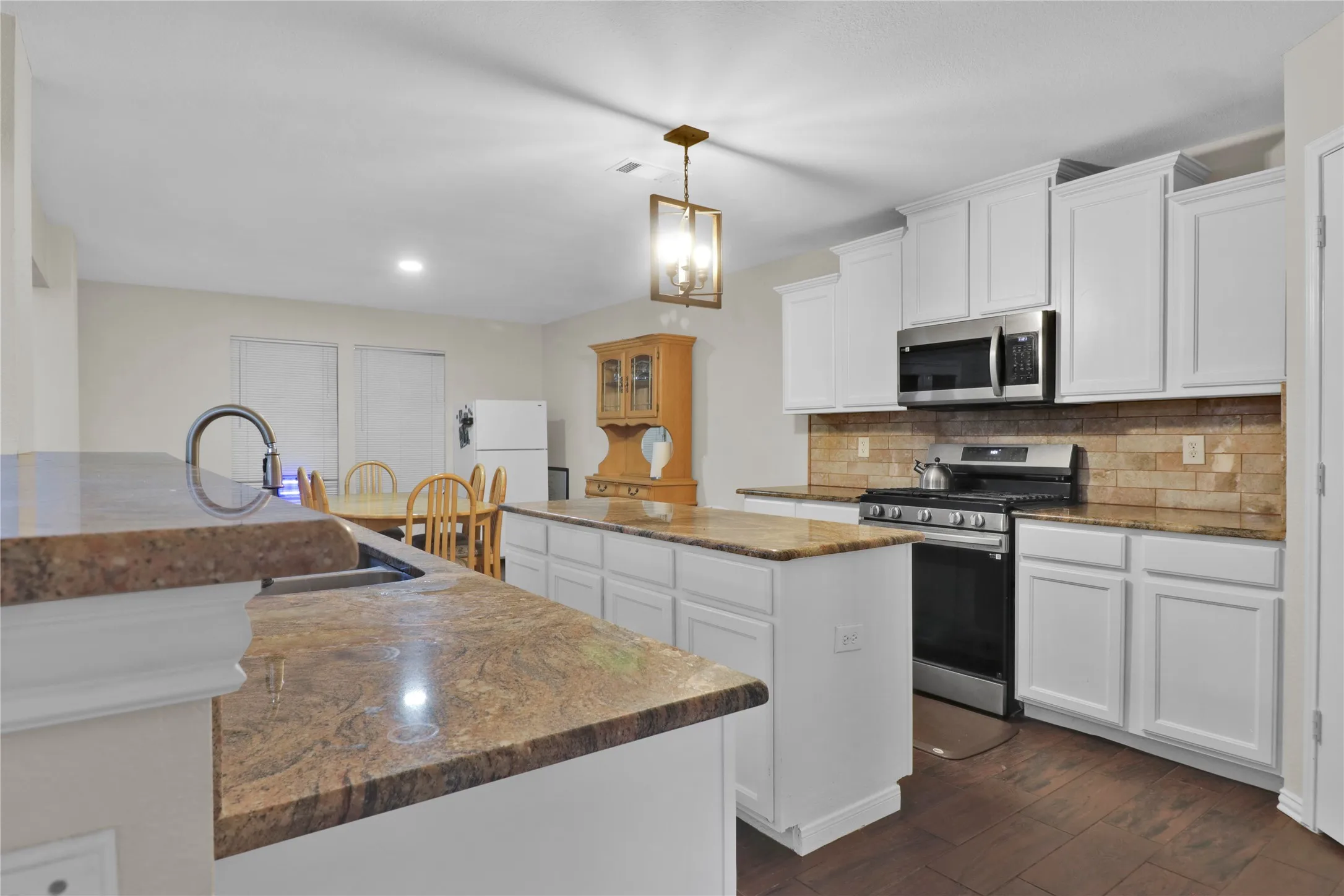 Another view of the kitchen and breakfast area.