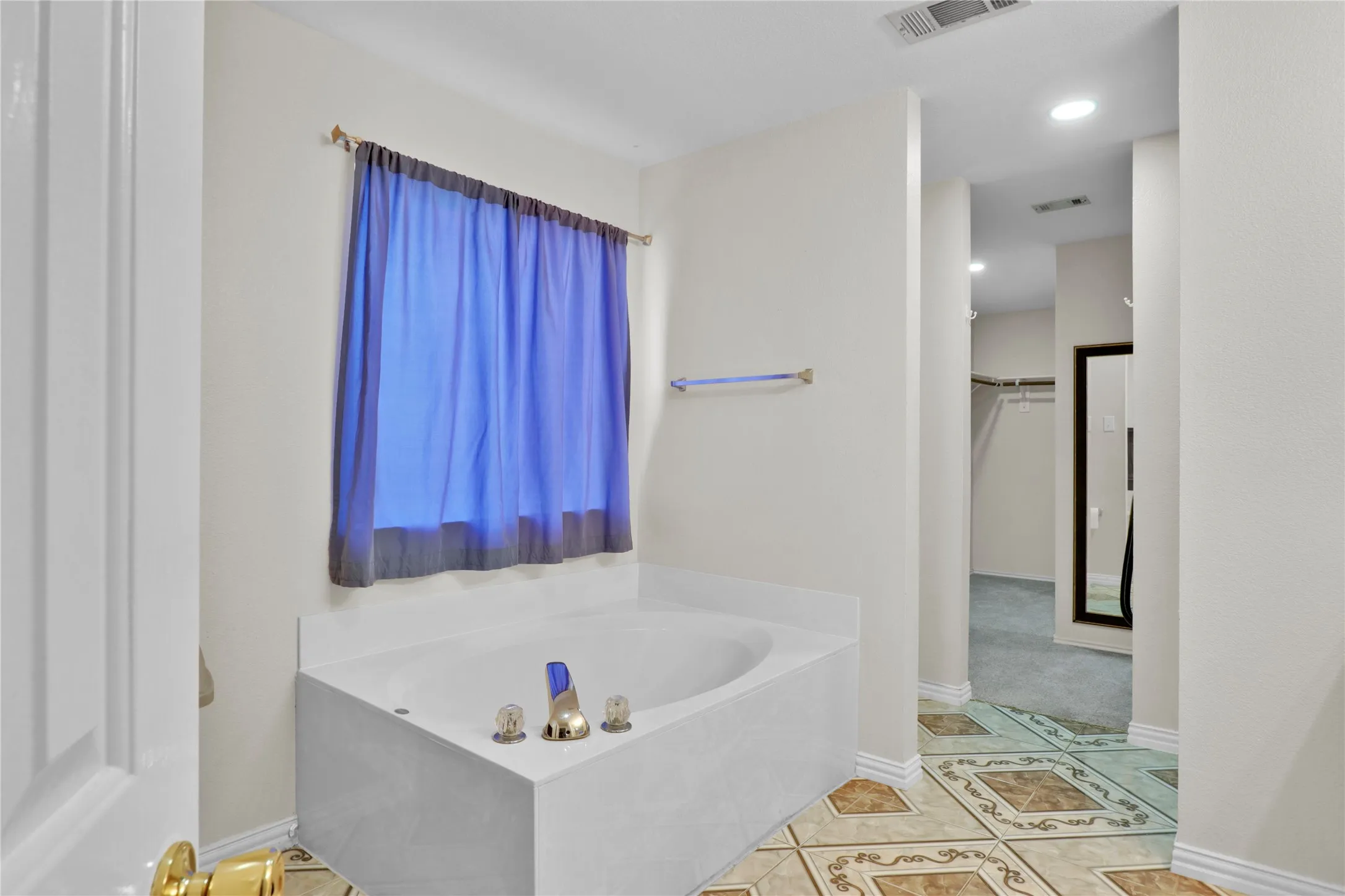 Master bath with garden tub.