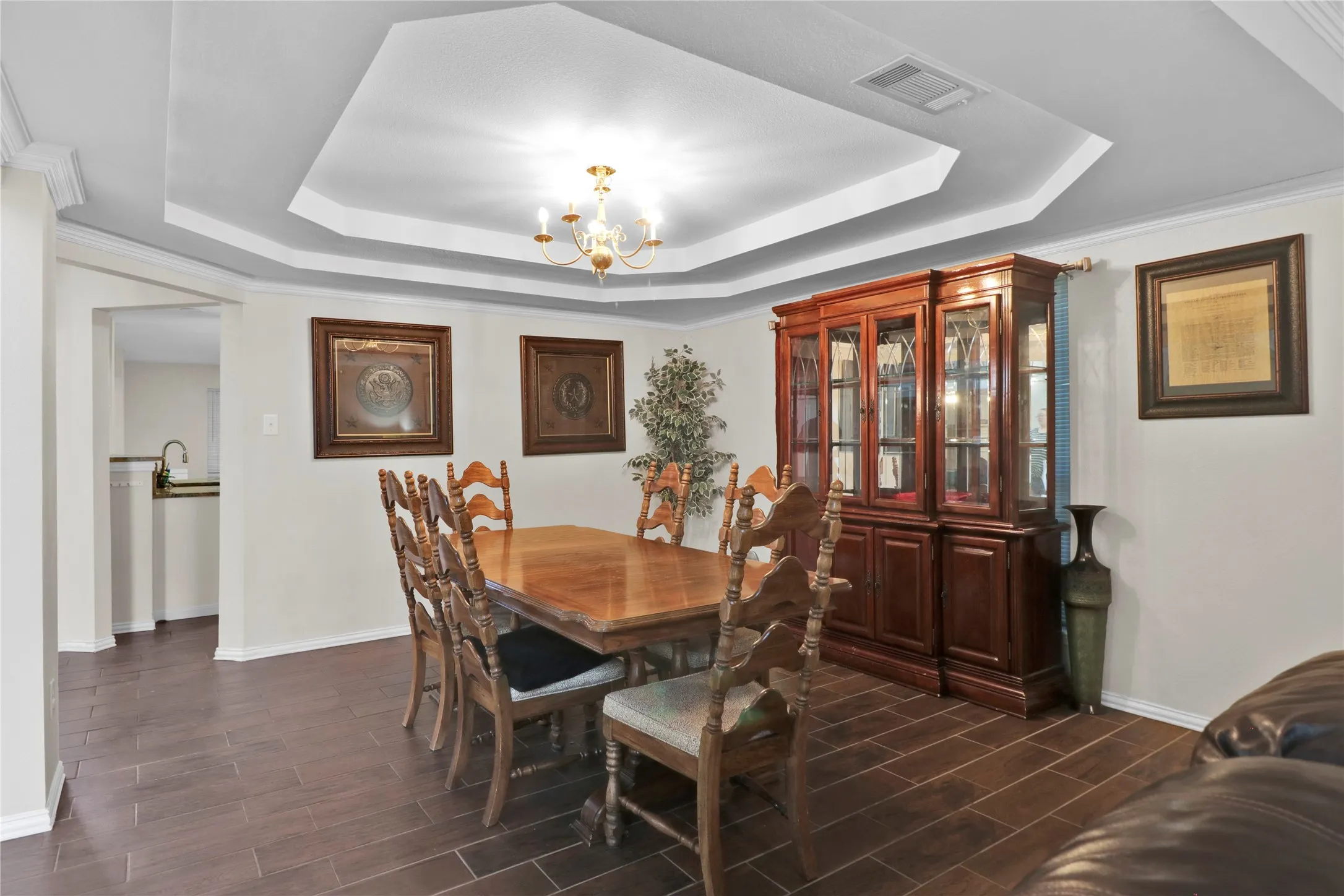 Formal dining. If you are a big entertainer, could make the formal living and formal dining one large dining room.