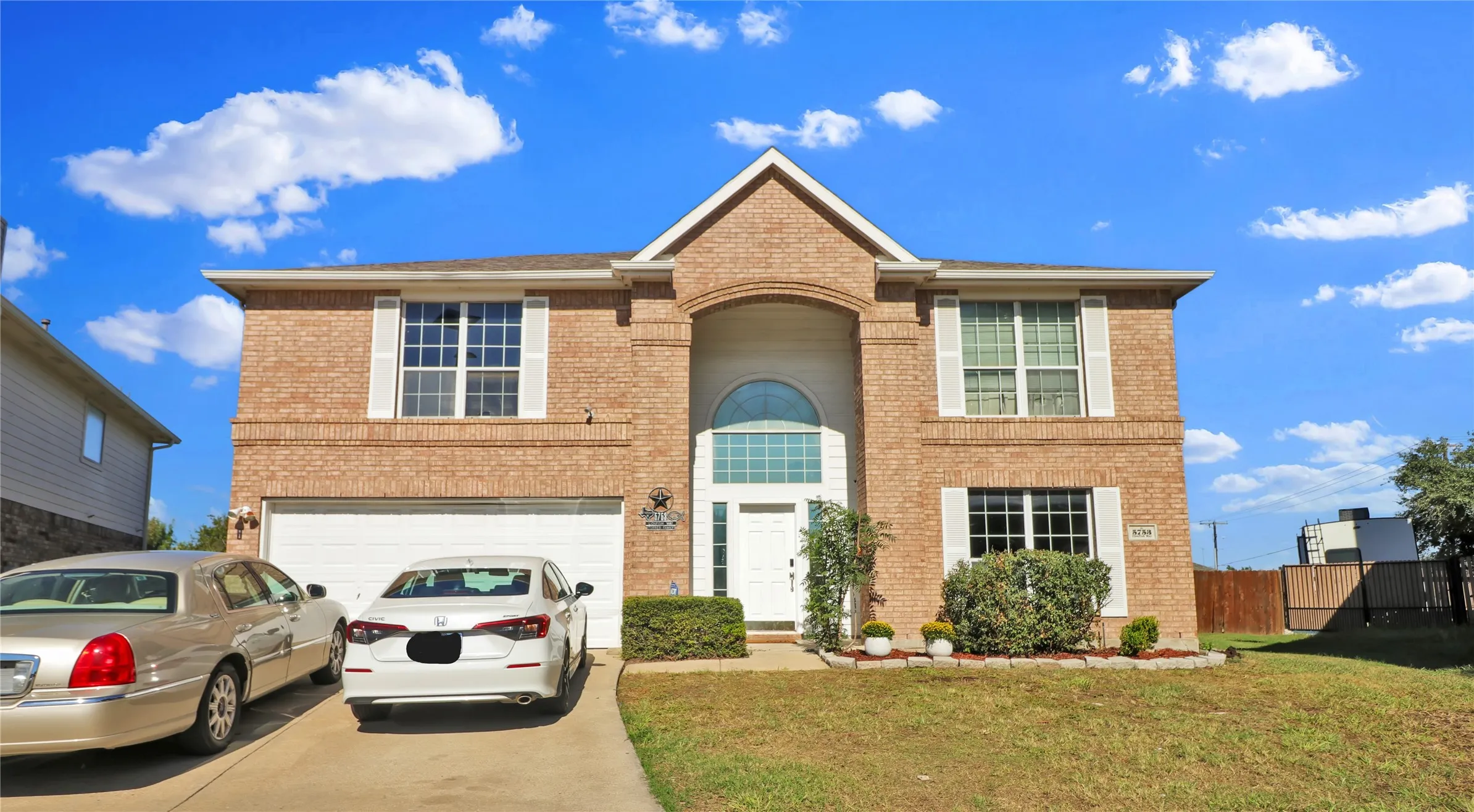 Front view of home on cul de sac.