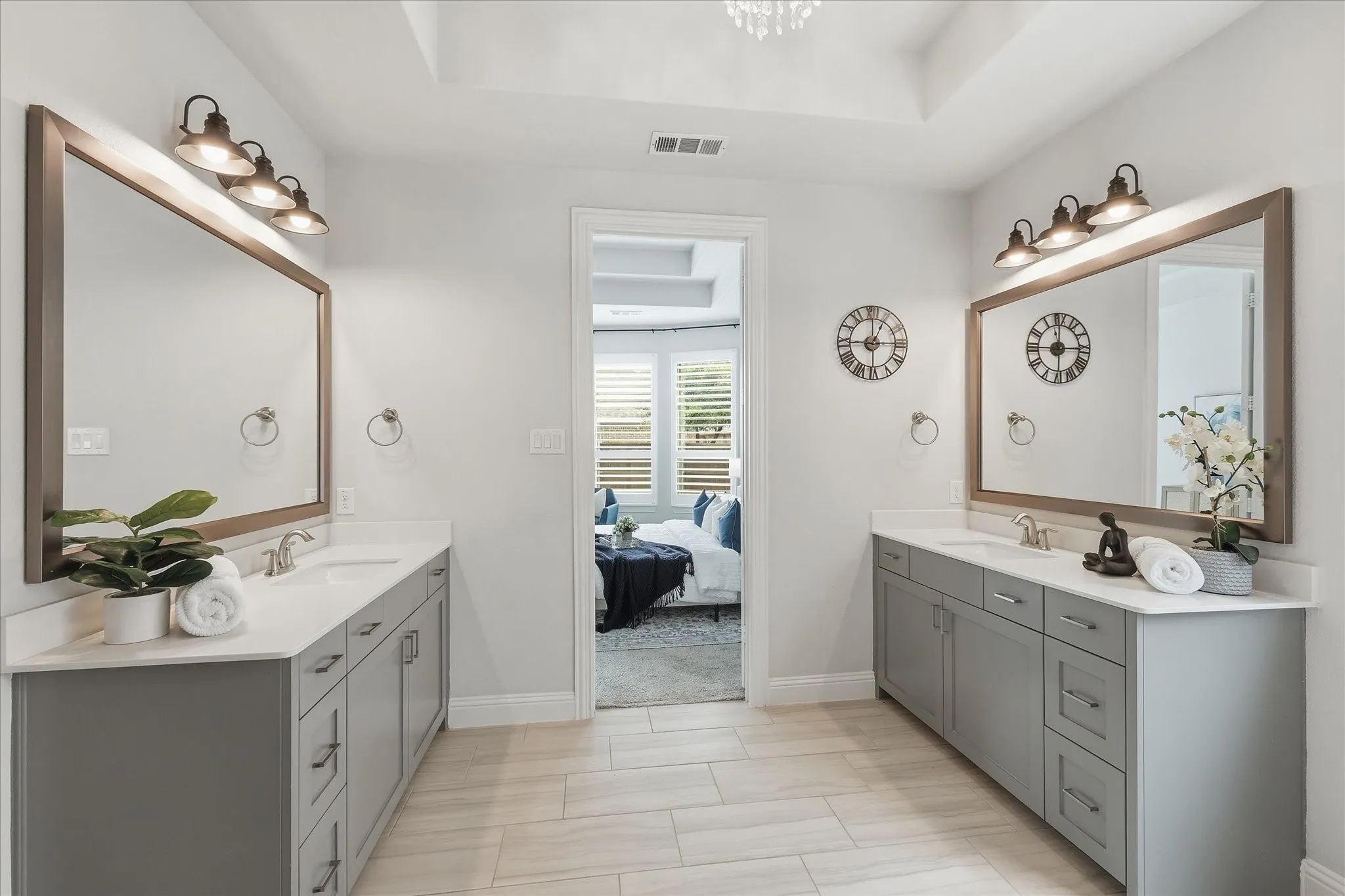 Dual vanities and xlarge mirrors in the primary bathroom!
