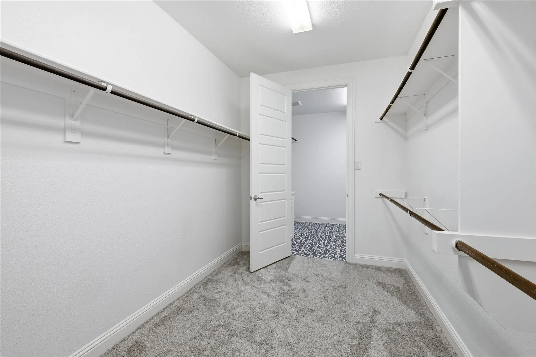 Walk-in closet connects to laundry! how convenient!