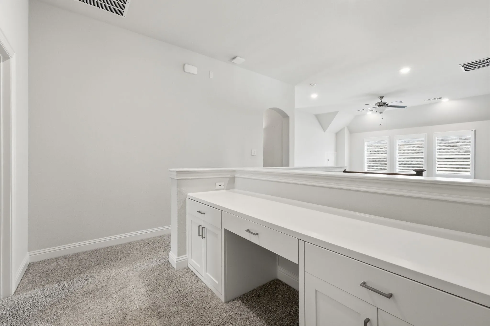 Built in desk adjacent to secondary bedrooms.