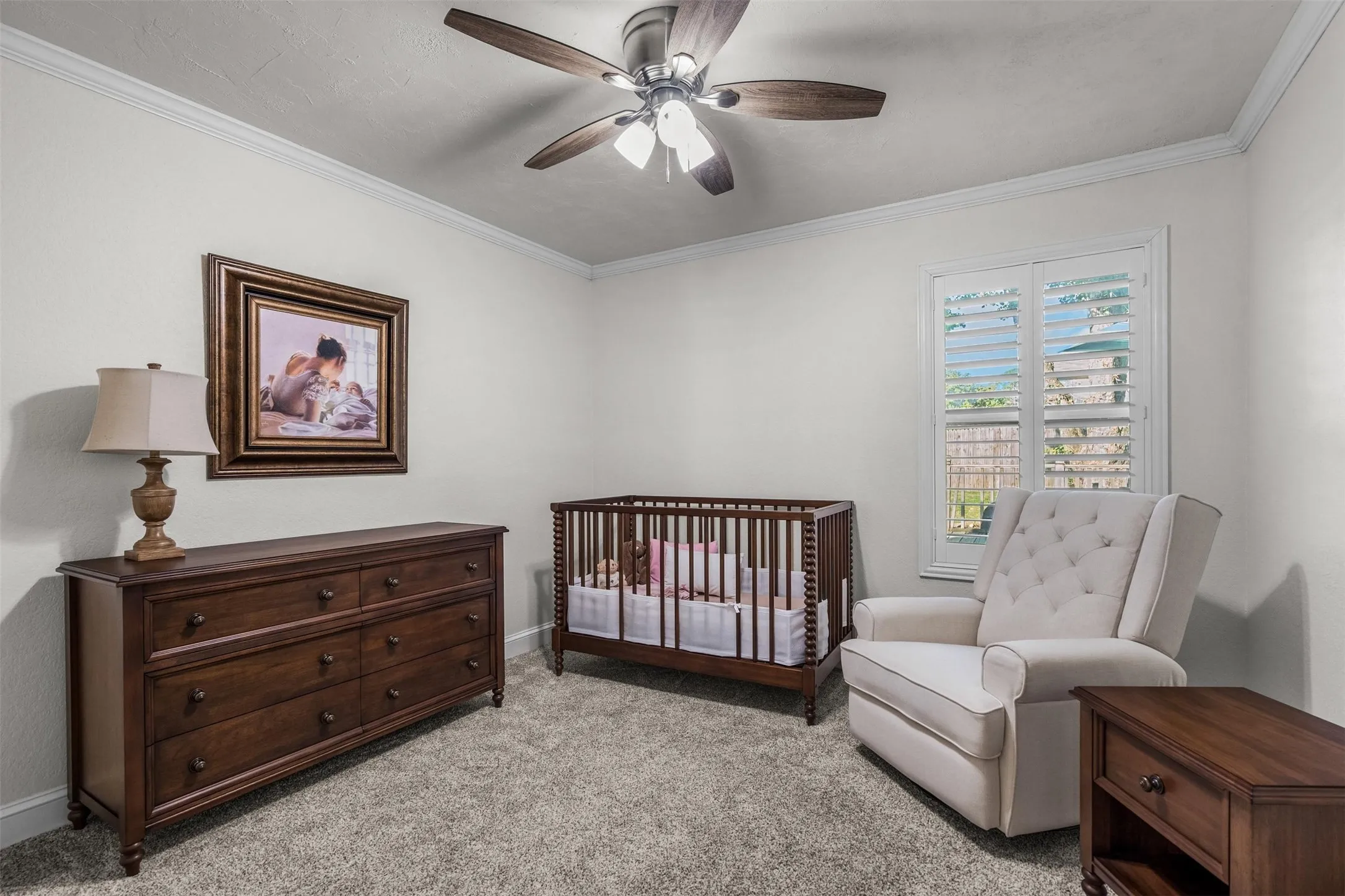 Fourth bedroom with plantation shutters.