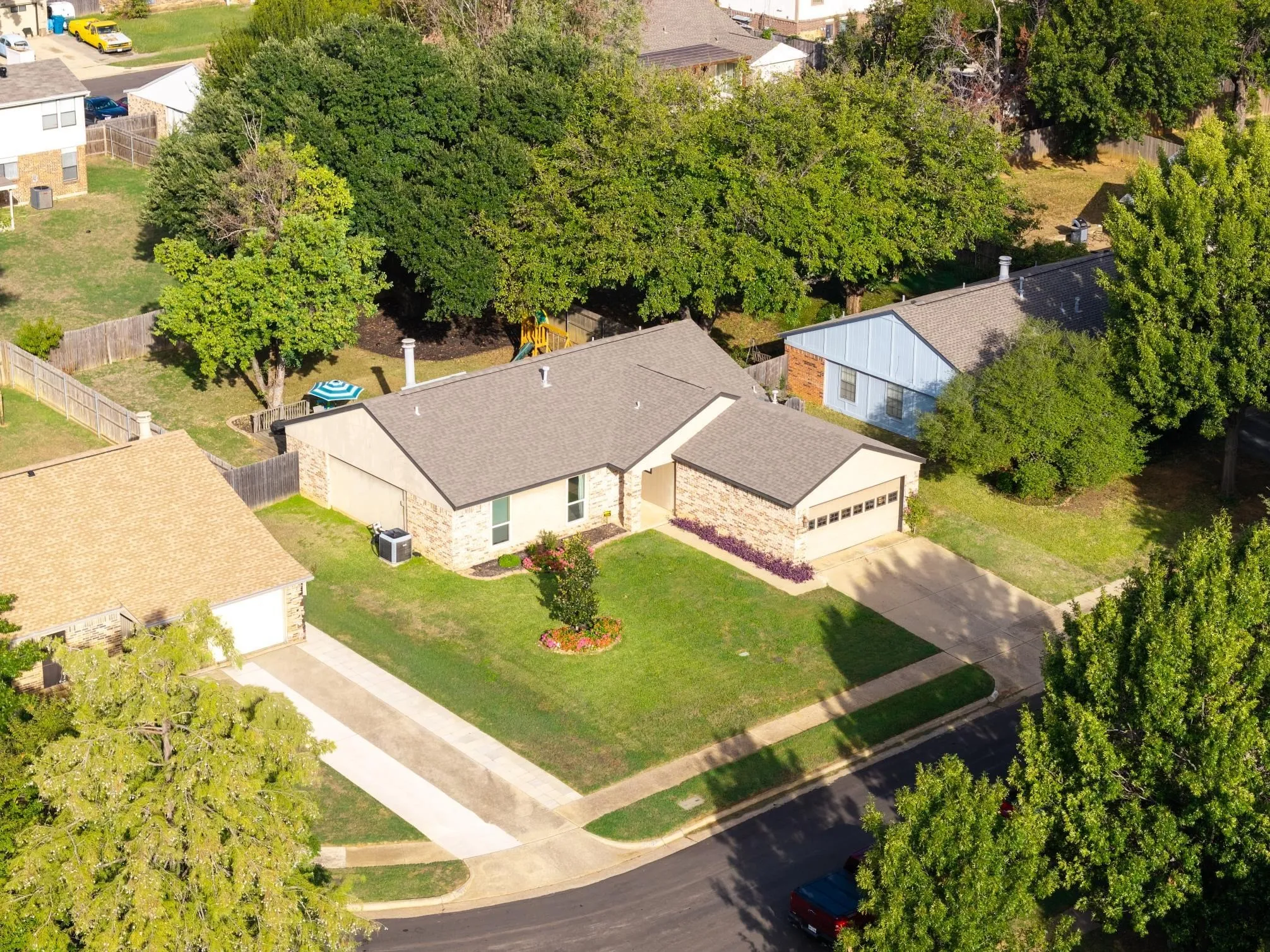 A tree-lined street in the heart of Flower Mound.