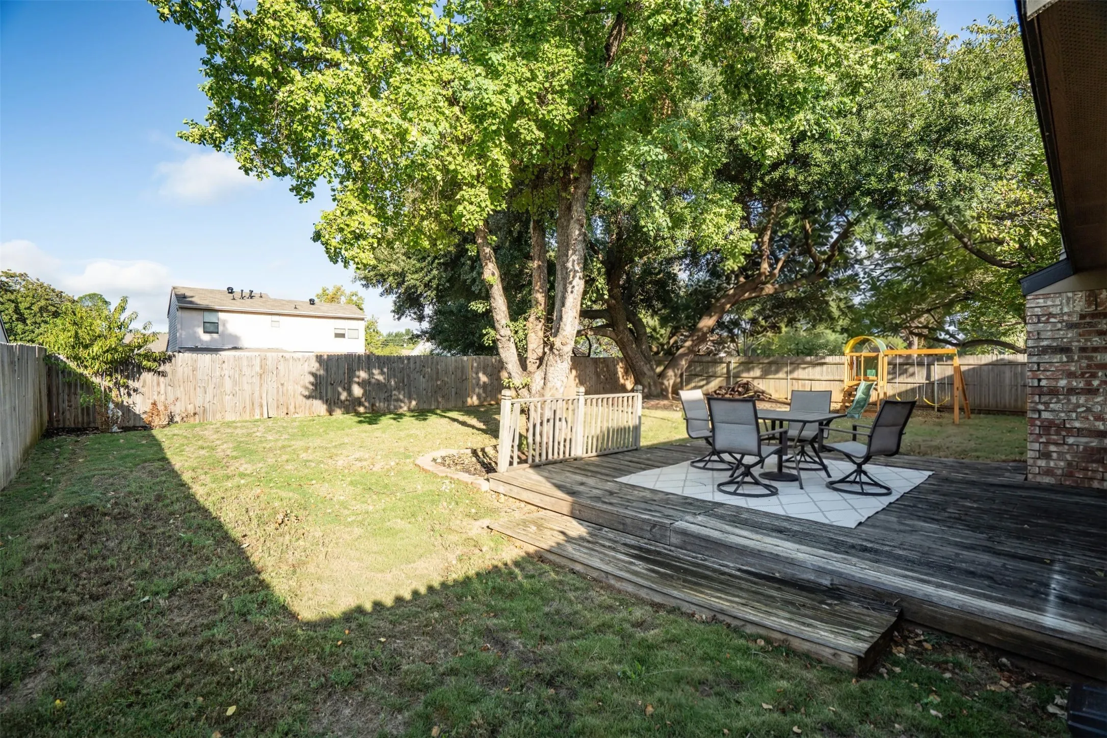 Wood deck off the back of the home.