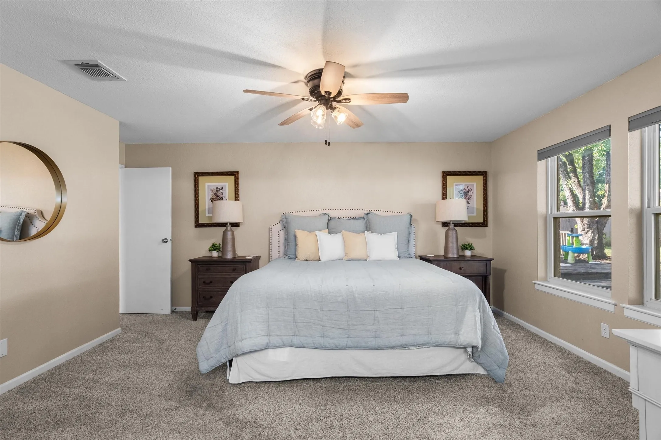 The primary bedroom is set apart from the other bedrooms.
