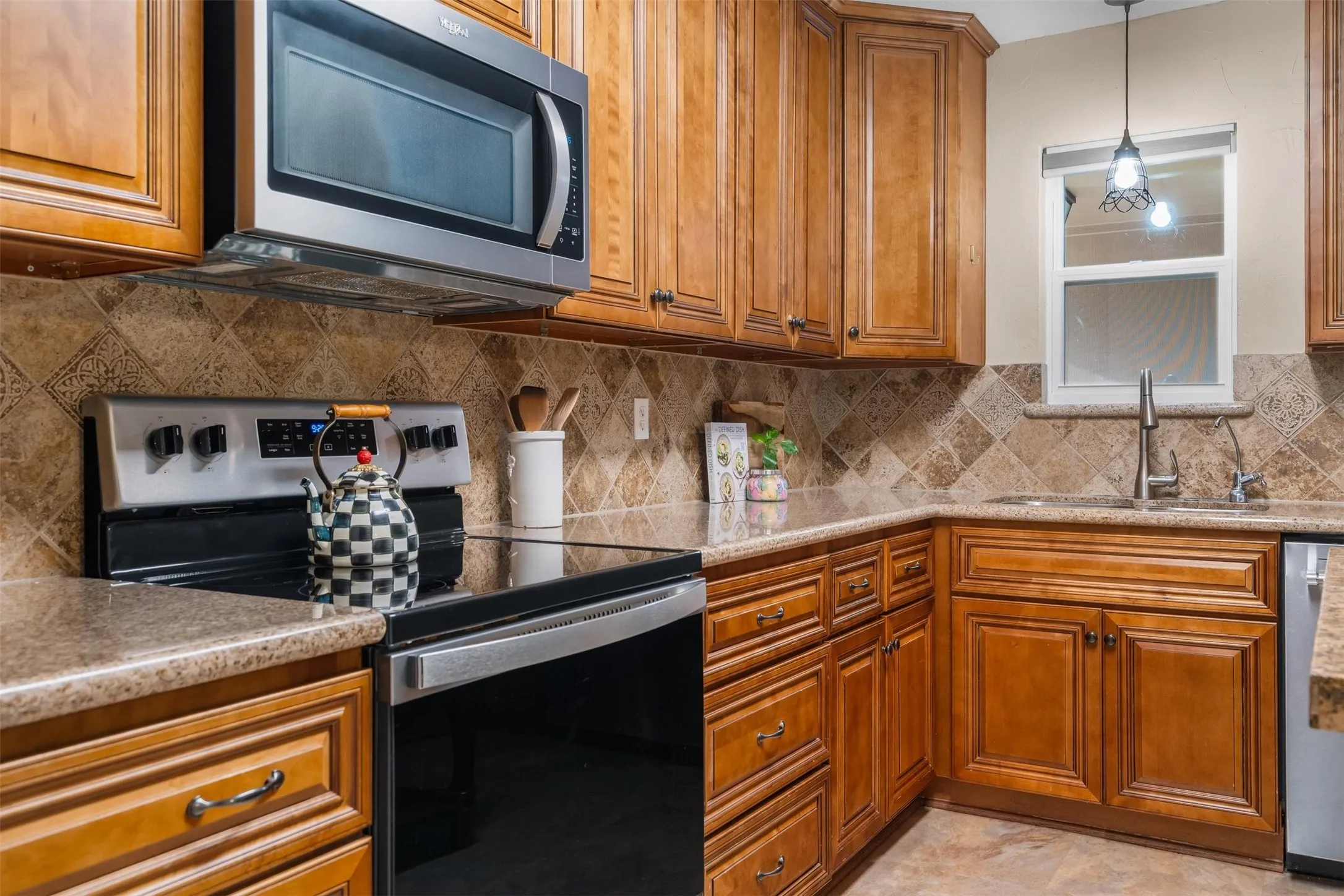 Electric range with a built-in microwave.