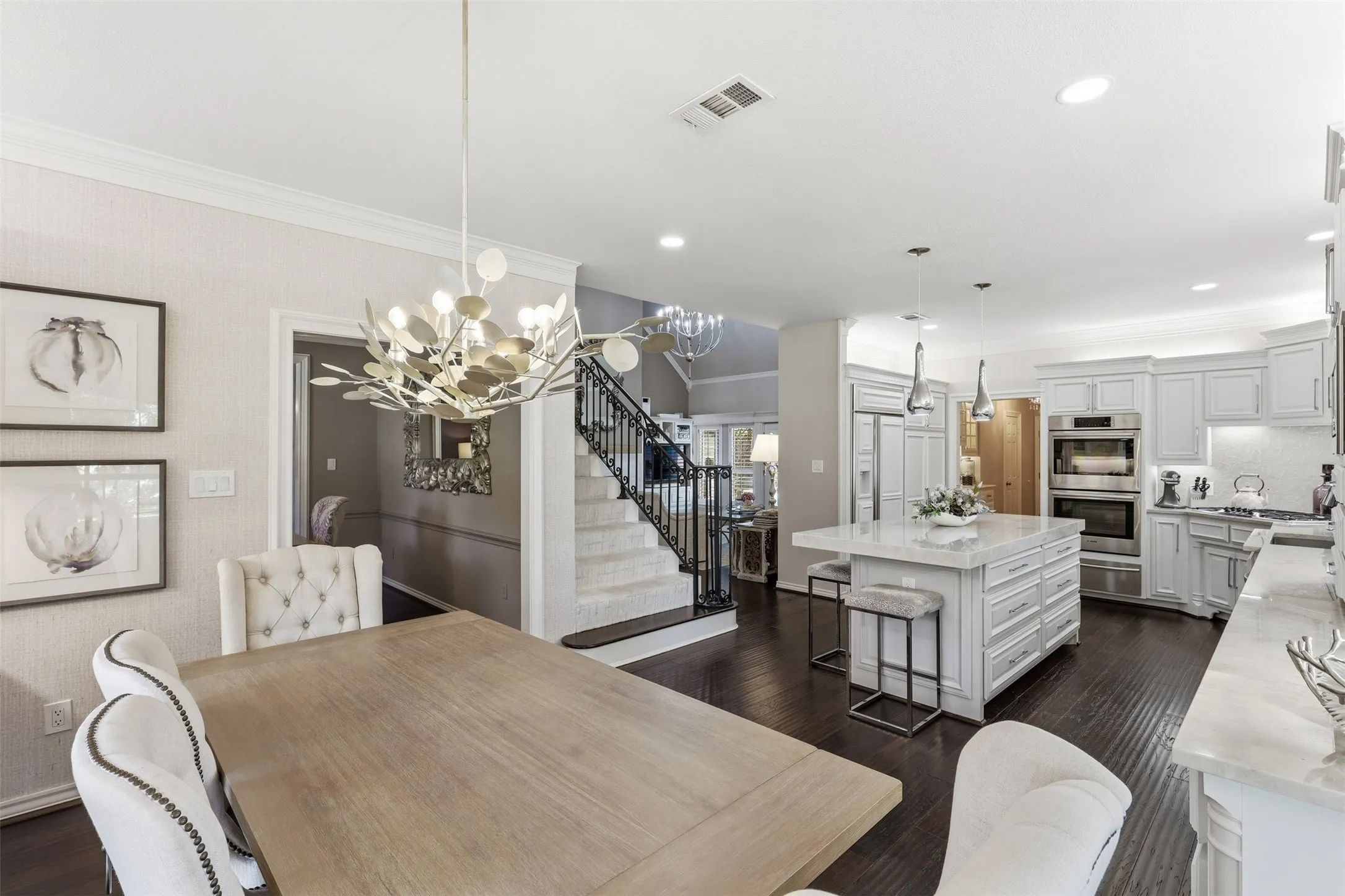 Breakfast area adjacent to formal dining and open to kitchen