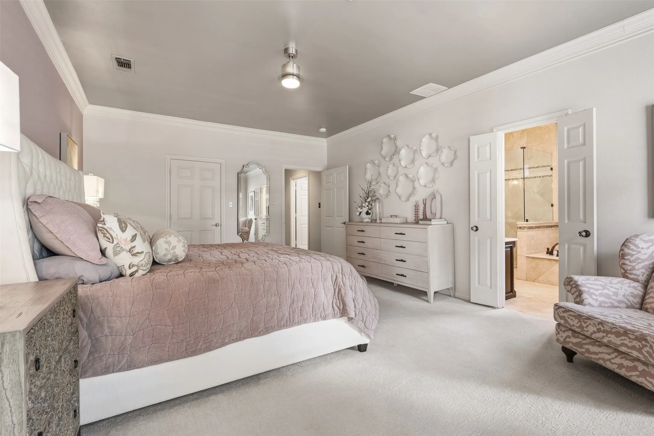 Two walk-in closets in primary bedroom