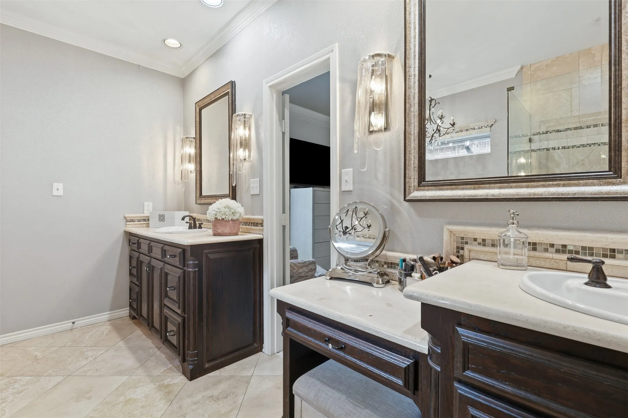 Primary bath with two sinks and vanity