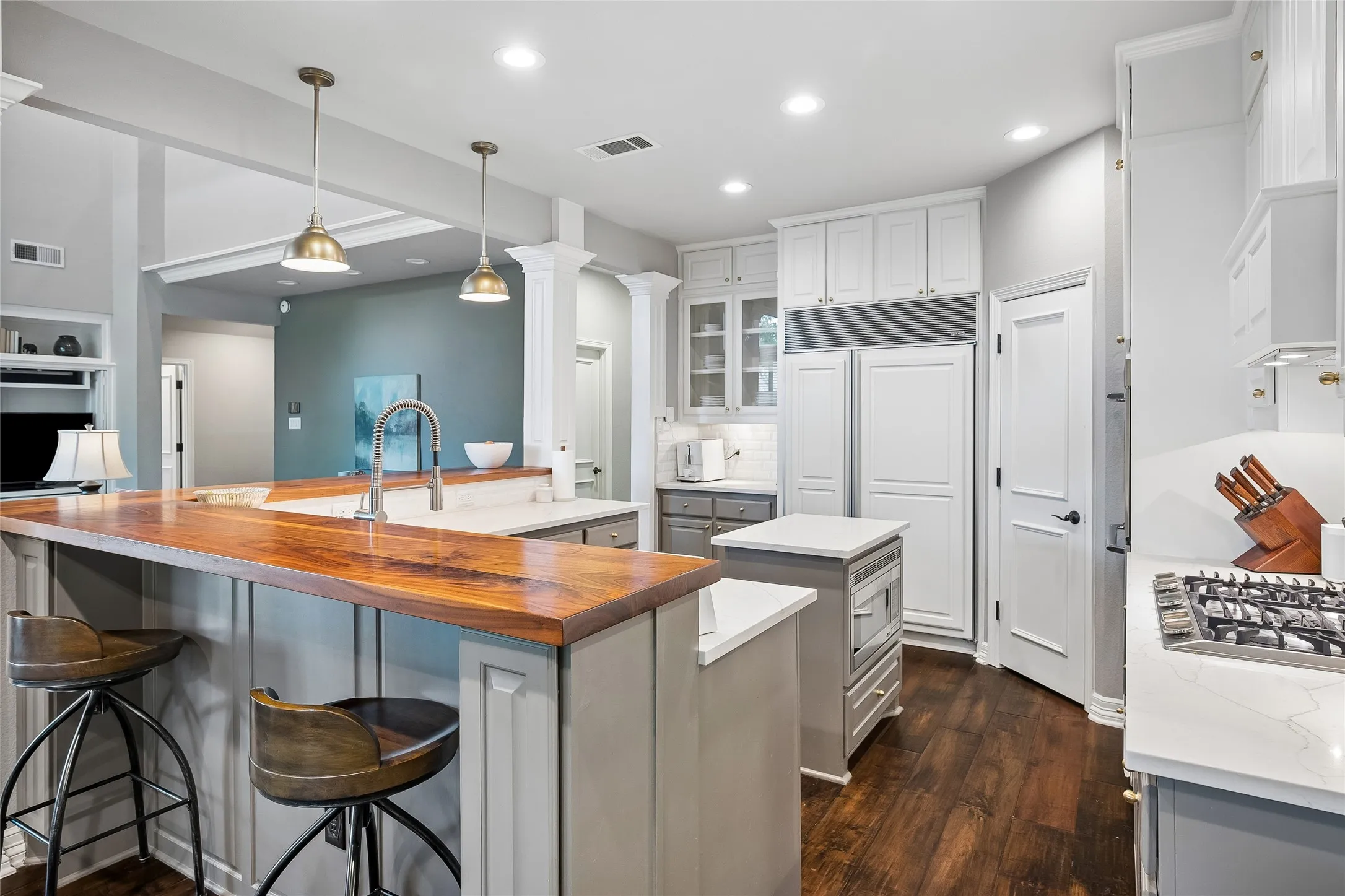 Includes Wood BarTop for Eat-In Quartz countertops, Built In Refrigerator