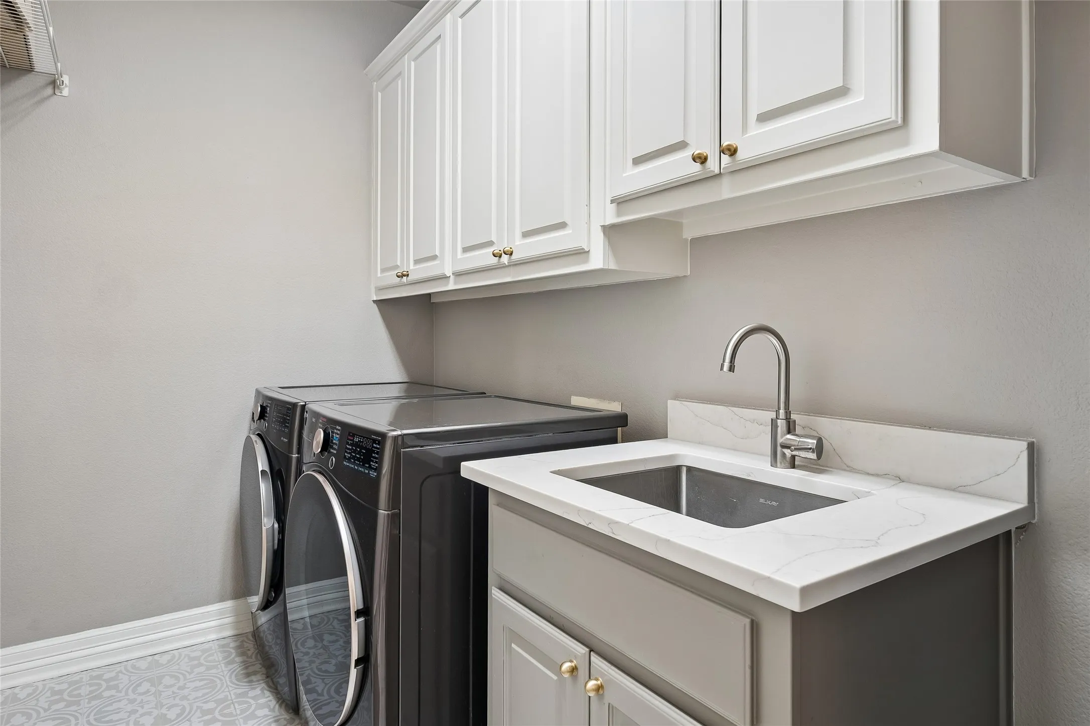 Includes Washer and Dryer and Sink, Wine Fridge also stays