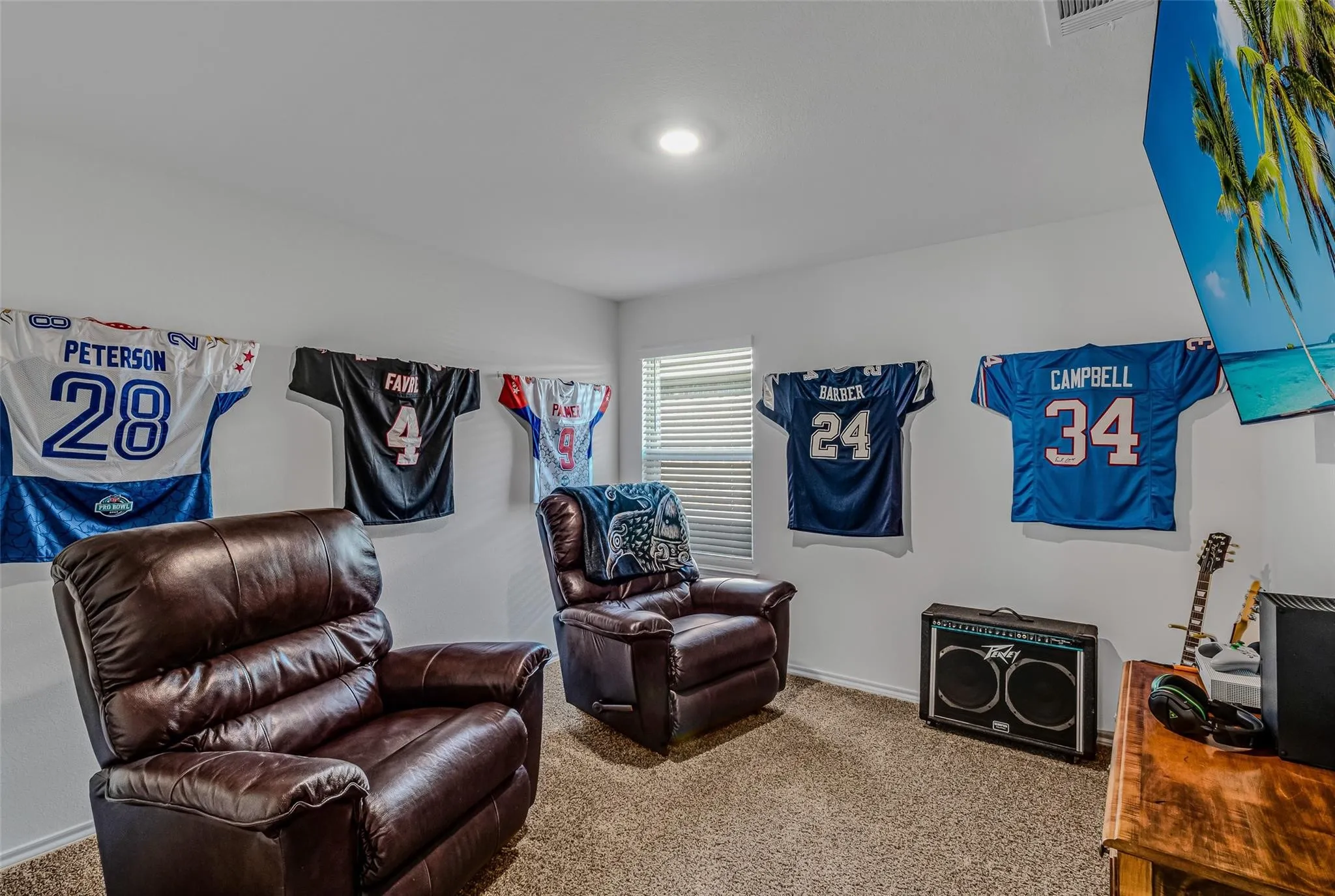 Living area featuring carpet