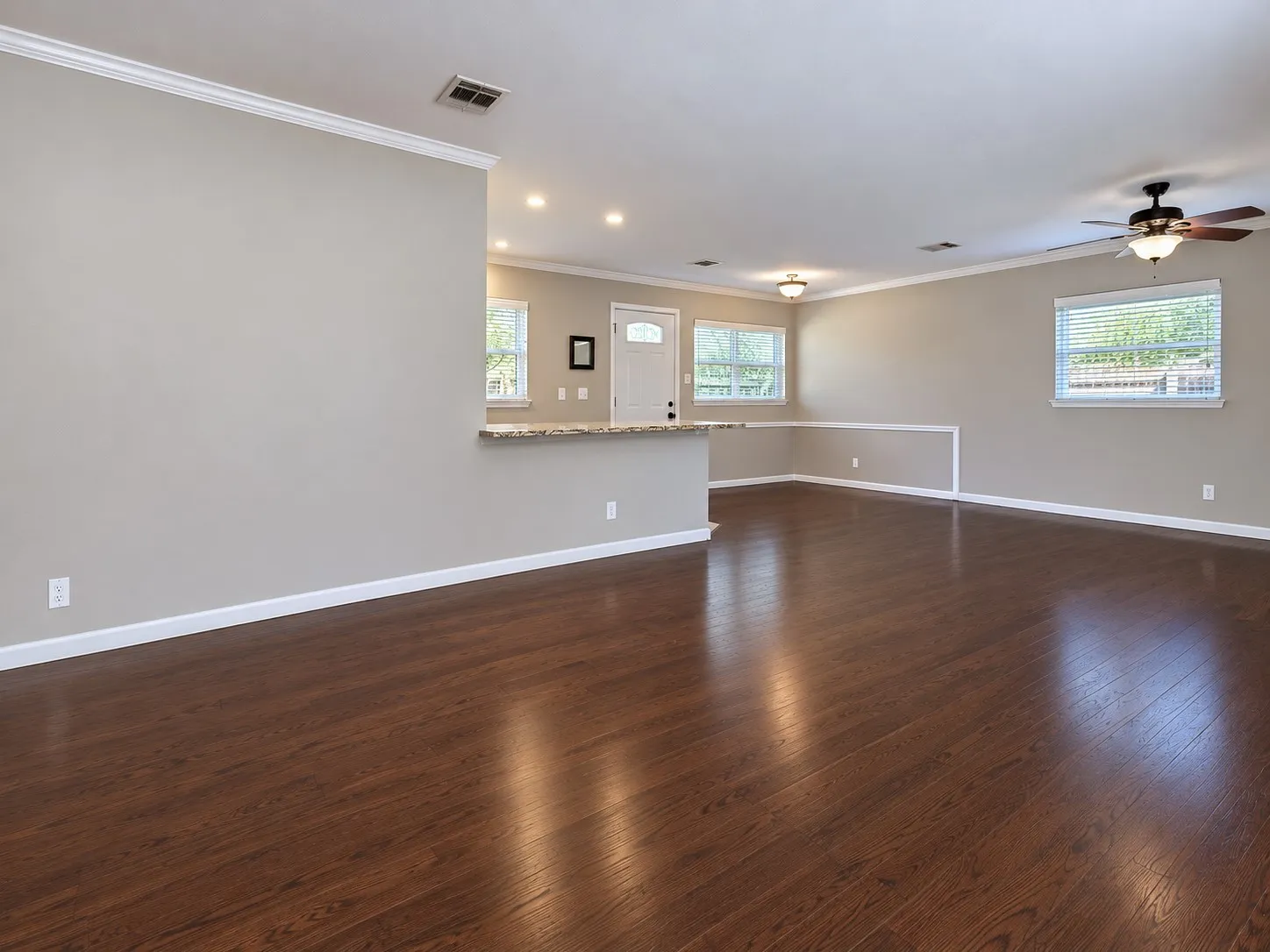 Large open living and dining room with extra space to work from home.