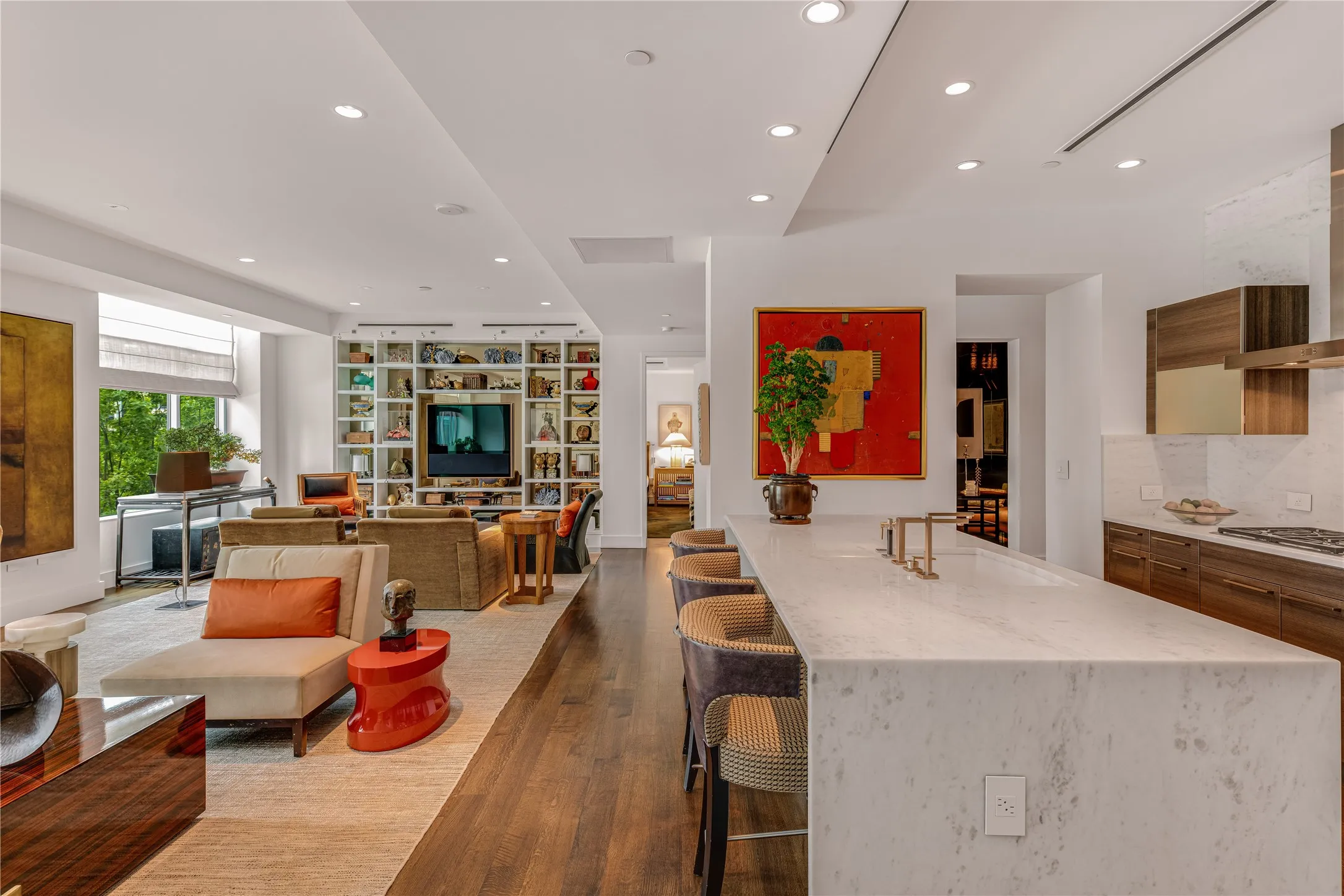 Spacious living area opens into gourmet kitchen.