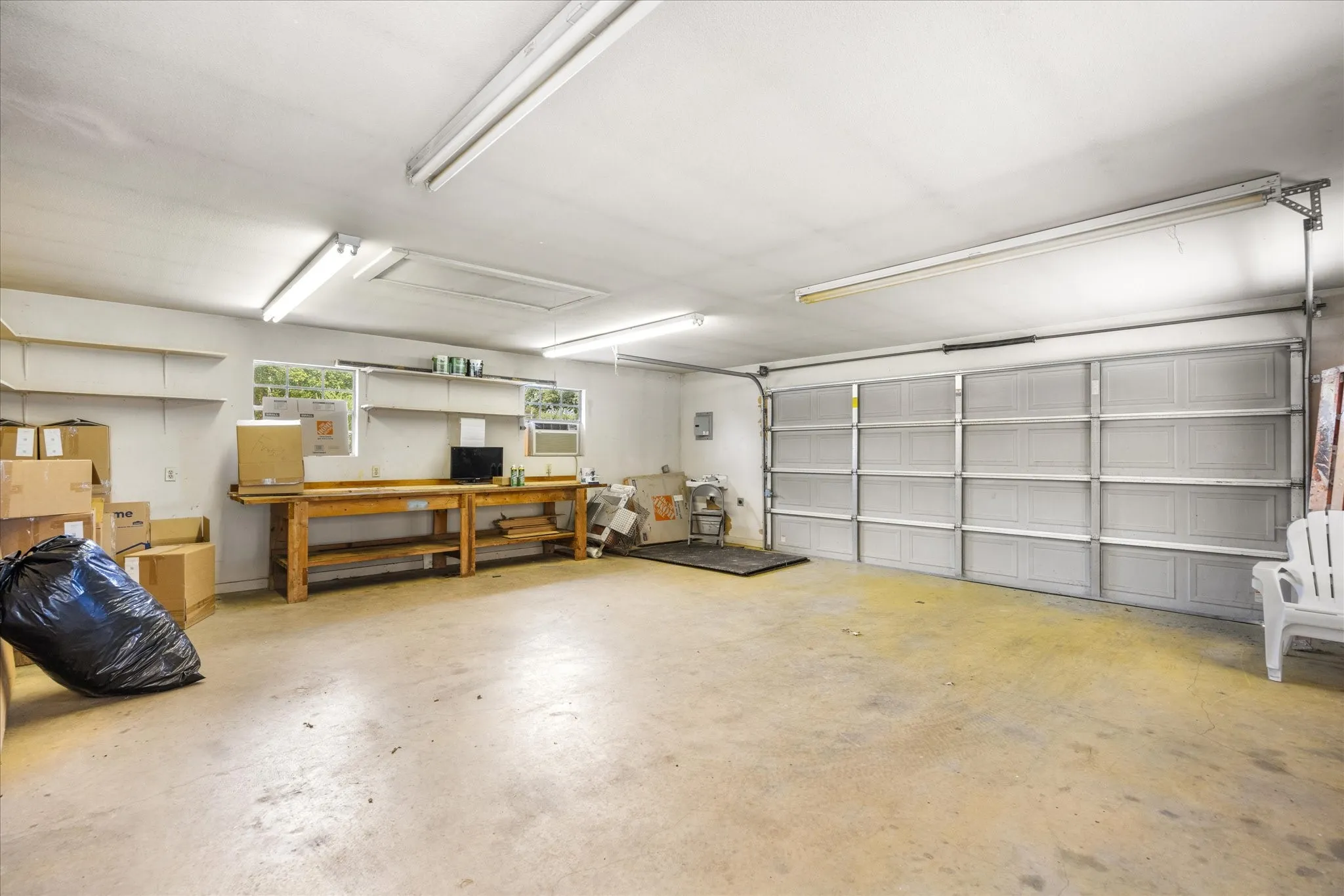 Currently being used as 1-car garage and workshop.  But, it could be your Man Cave or She Shed, easily.