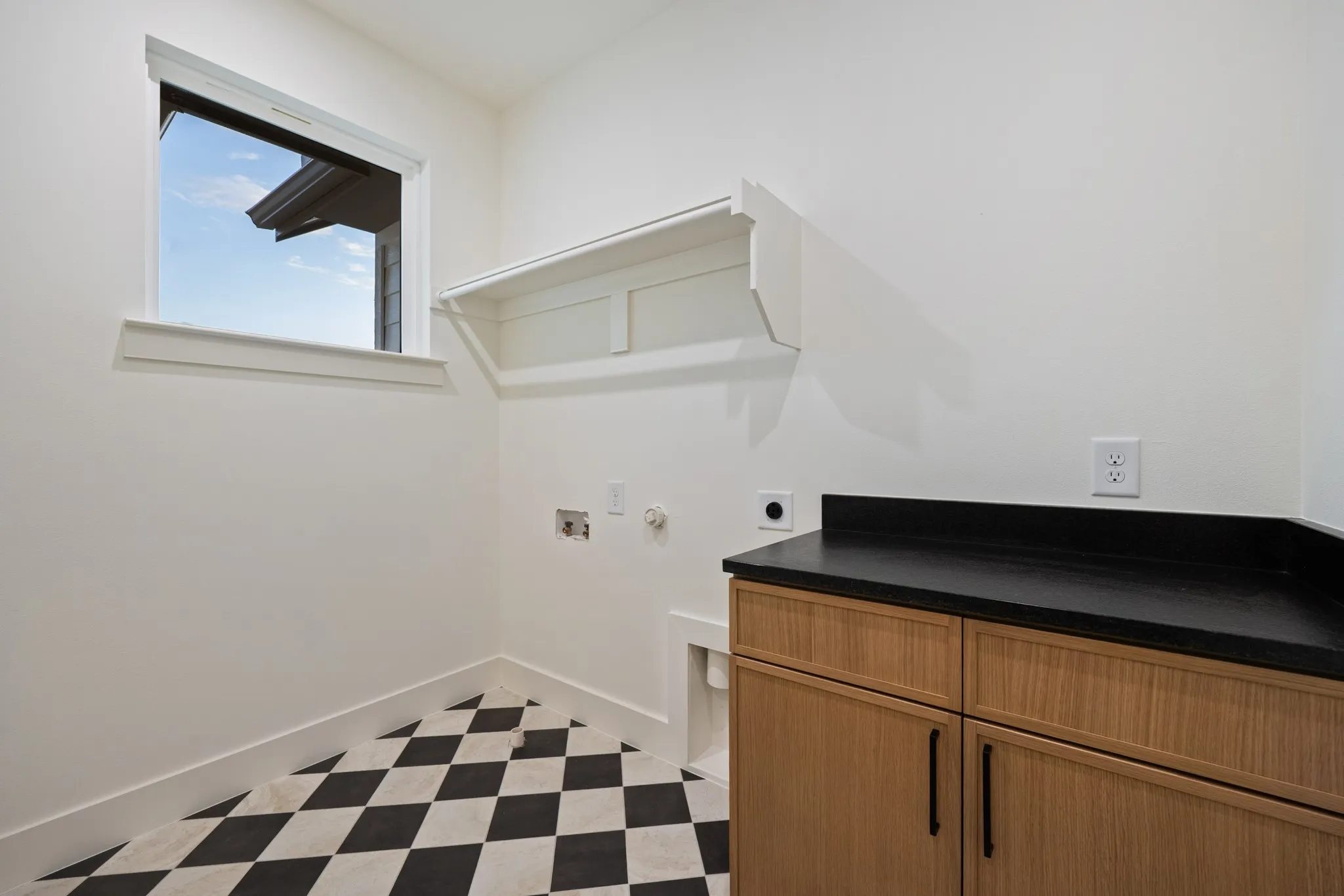 Checkered tile in the laundry room.