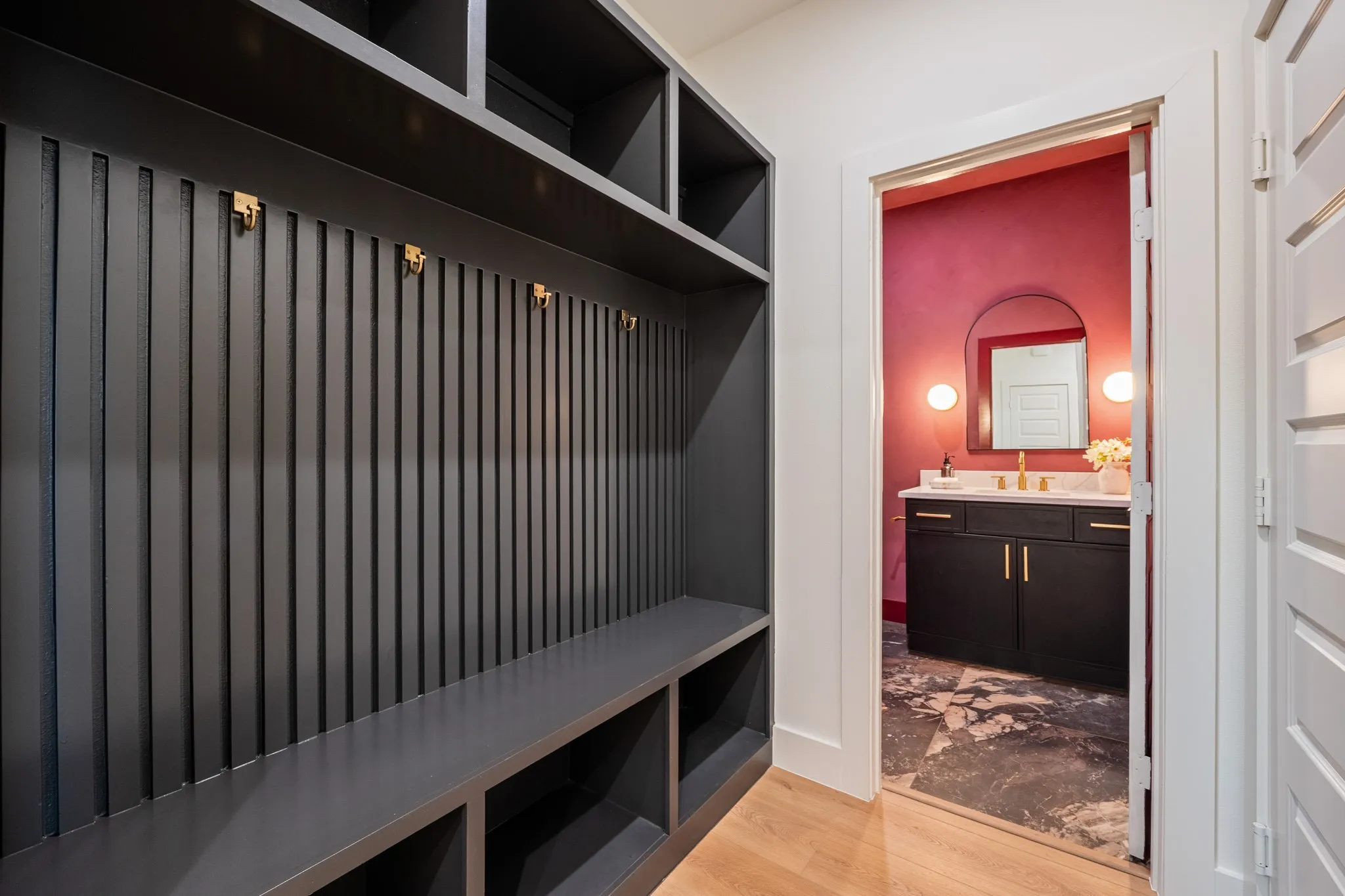 Mud room leading to powder bath.