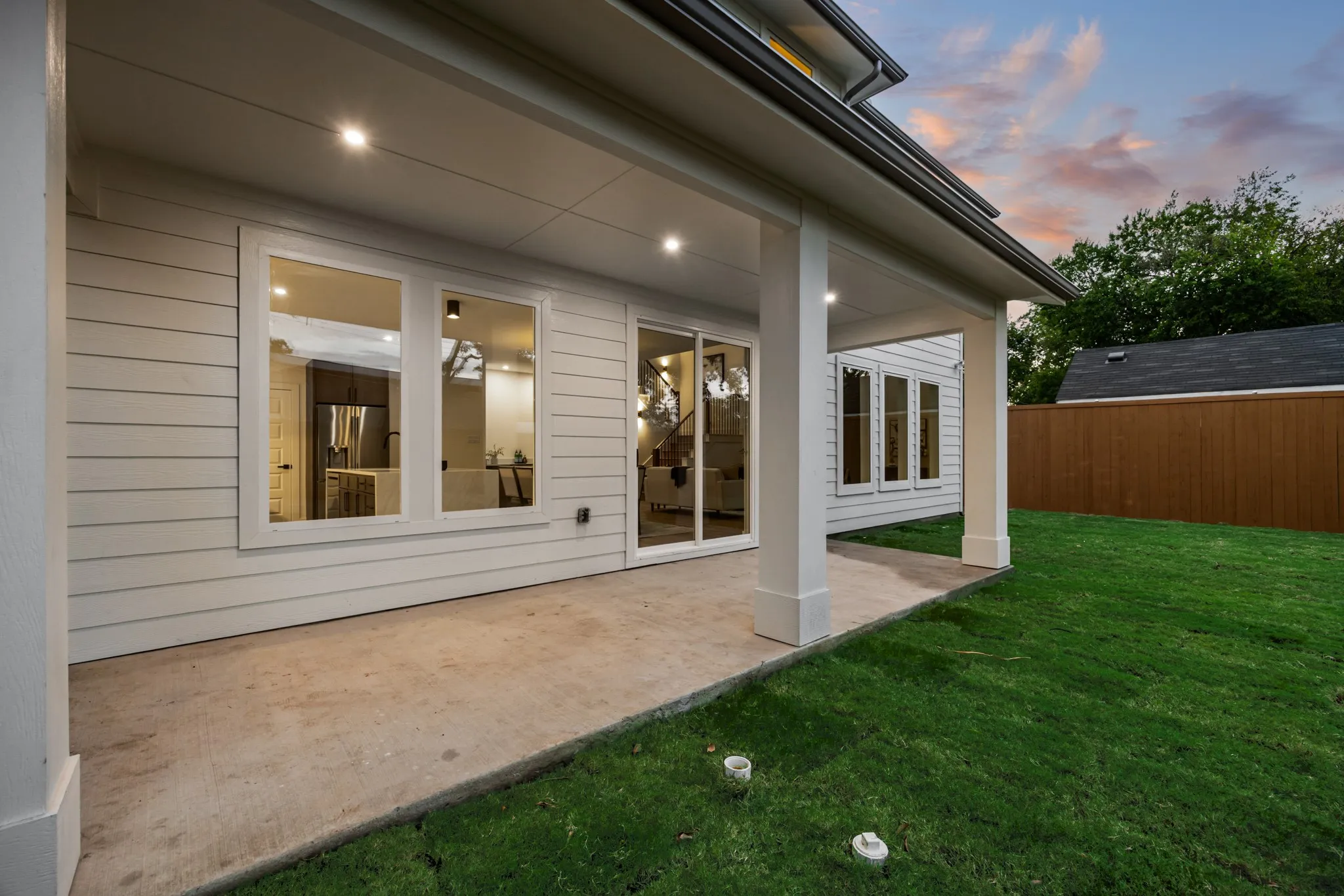 Large covered patio perfect for hosting friends and grilling​​‌​​​​‌​​‌‌​‌‌​​​‌‌​‌​‌​‌​​​‌​​ out.