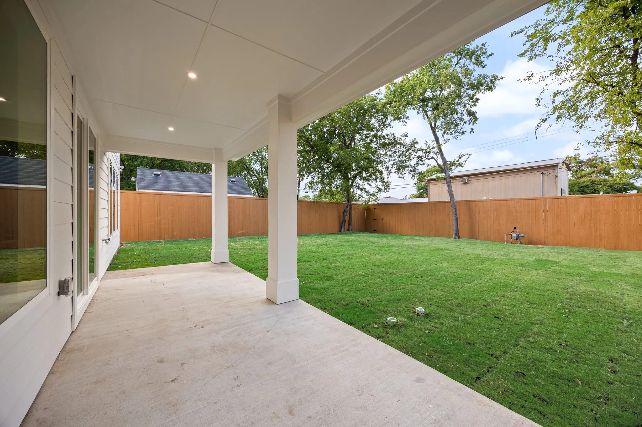8-foot privacy fence around the yard.