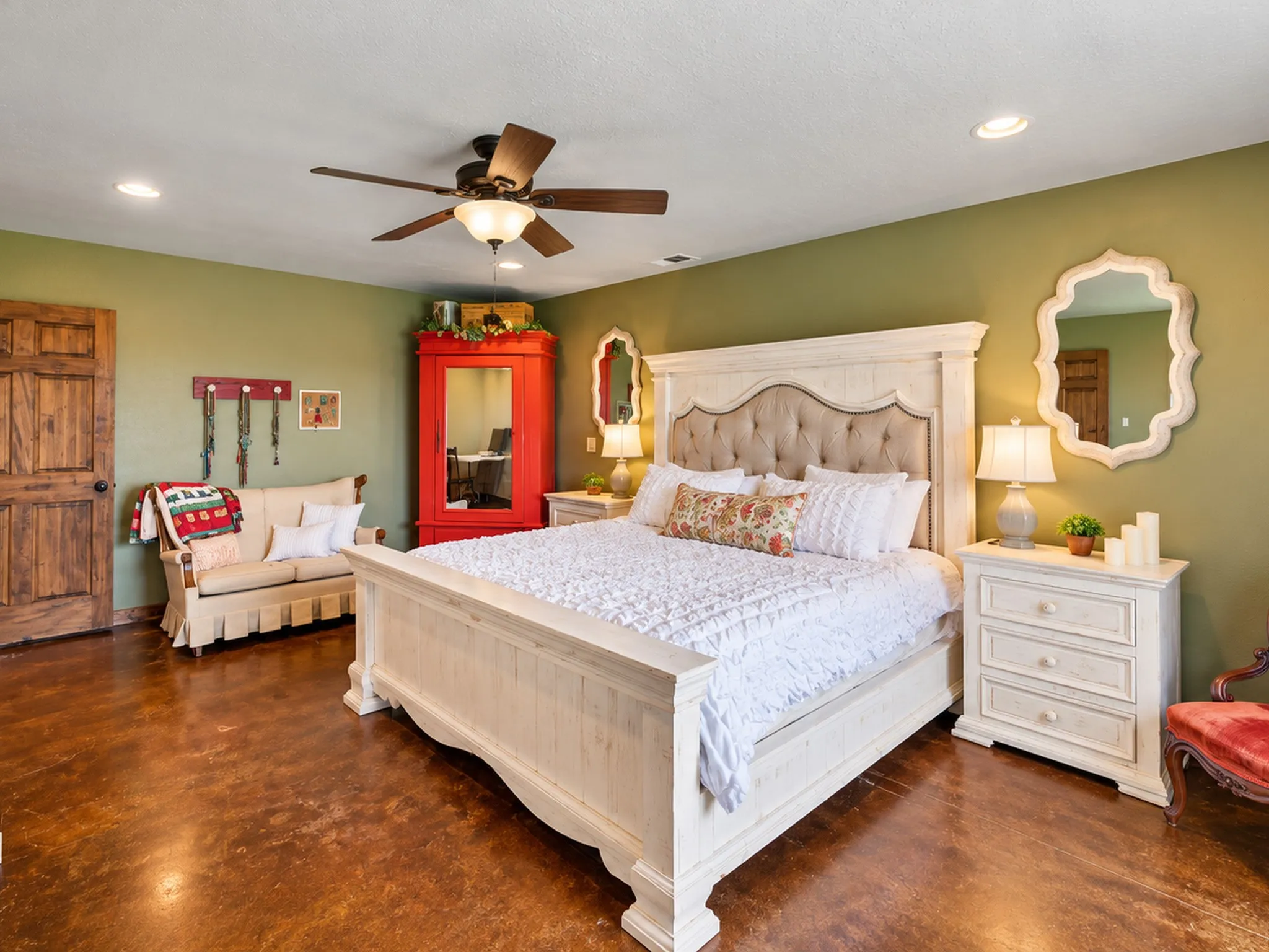 Wood-finish flooring, recessed lighting, and a ceiling fan with integrated lighting