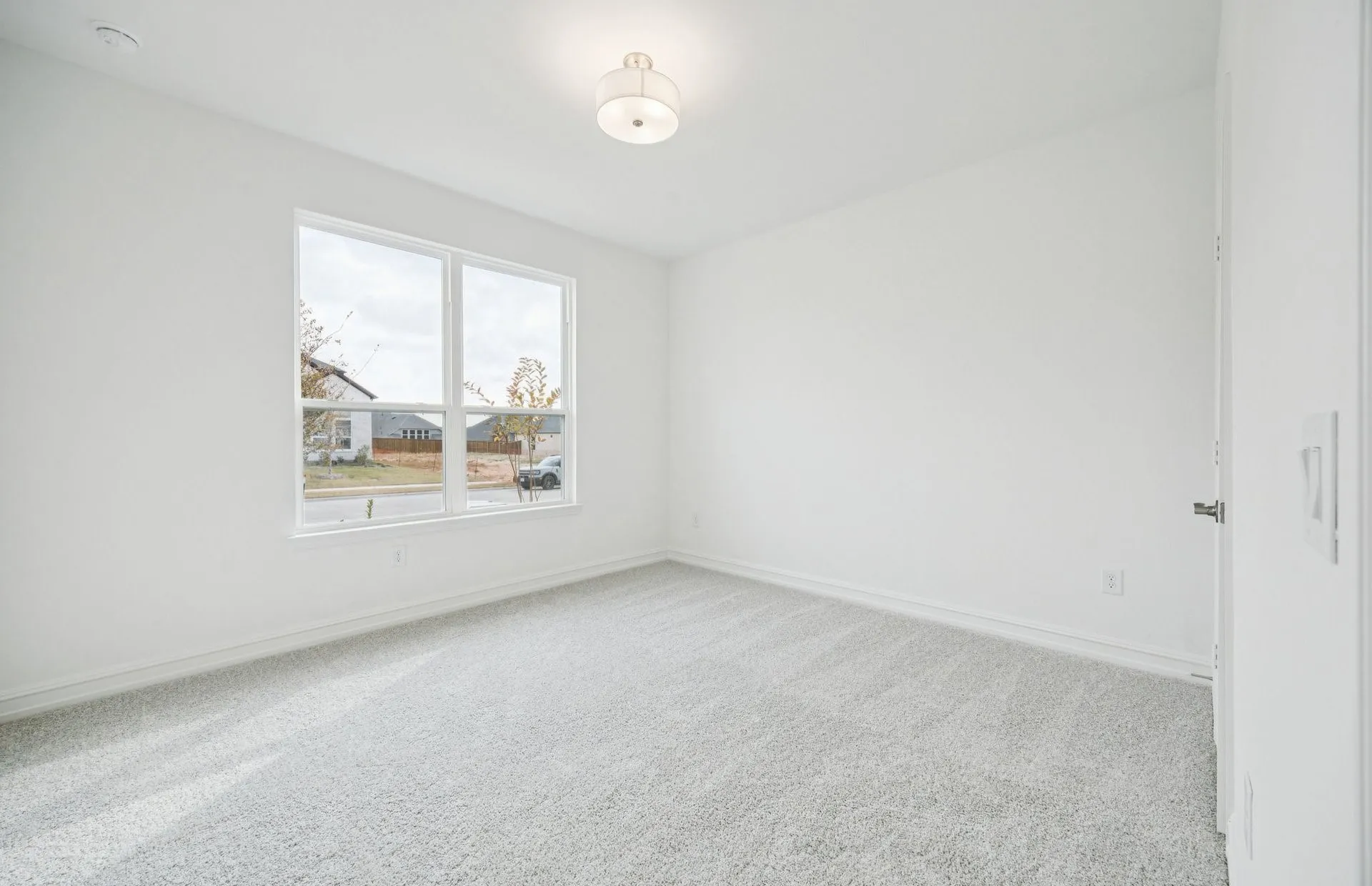 *Floorplan representation, not actual home - Spacious secondary bedroom with large windows