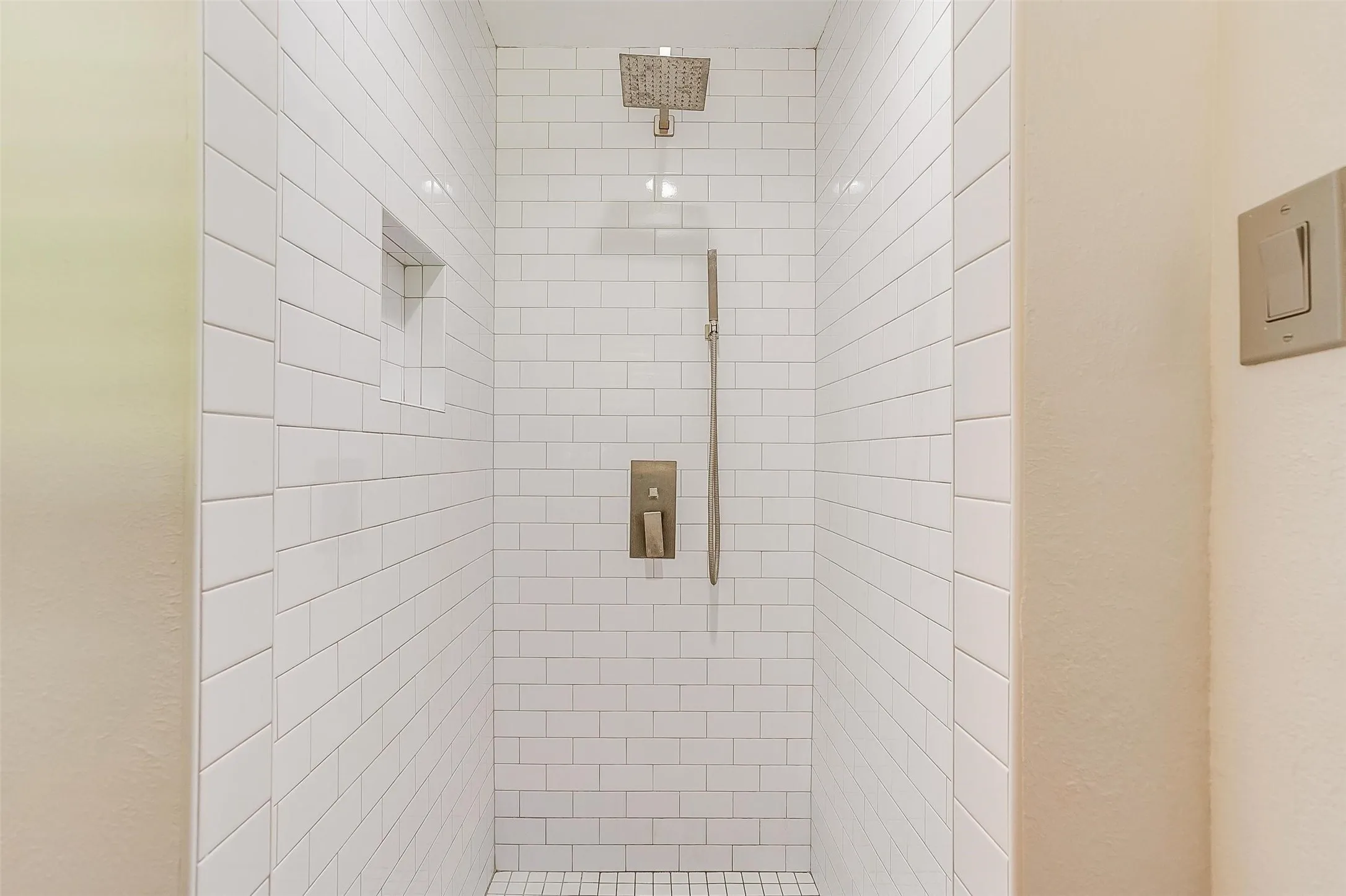 Bathroom with tiled shower